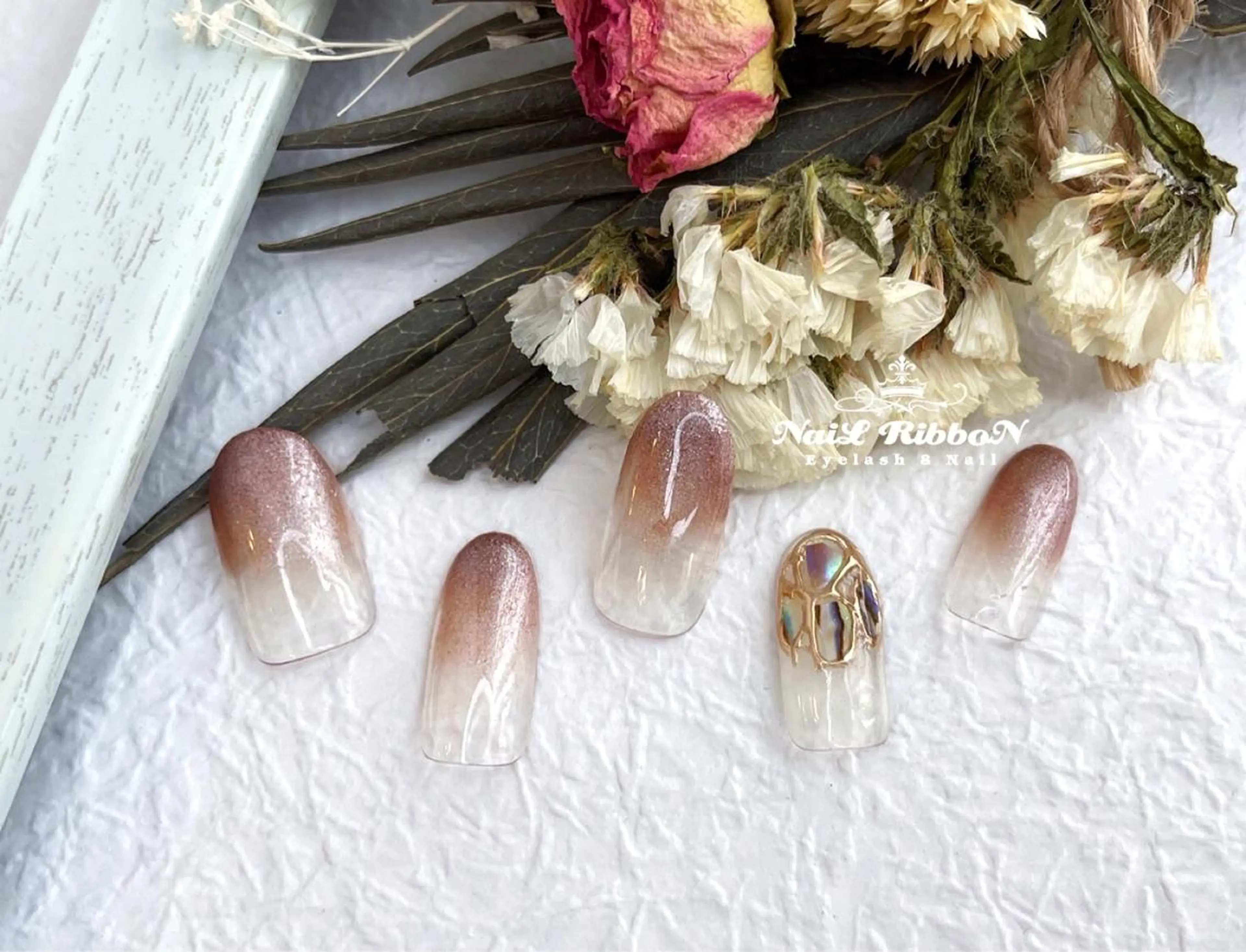 ネイル ネイルリボン 受付スタッフのネイルデザイン