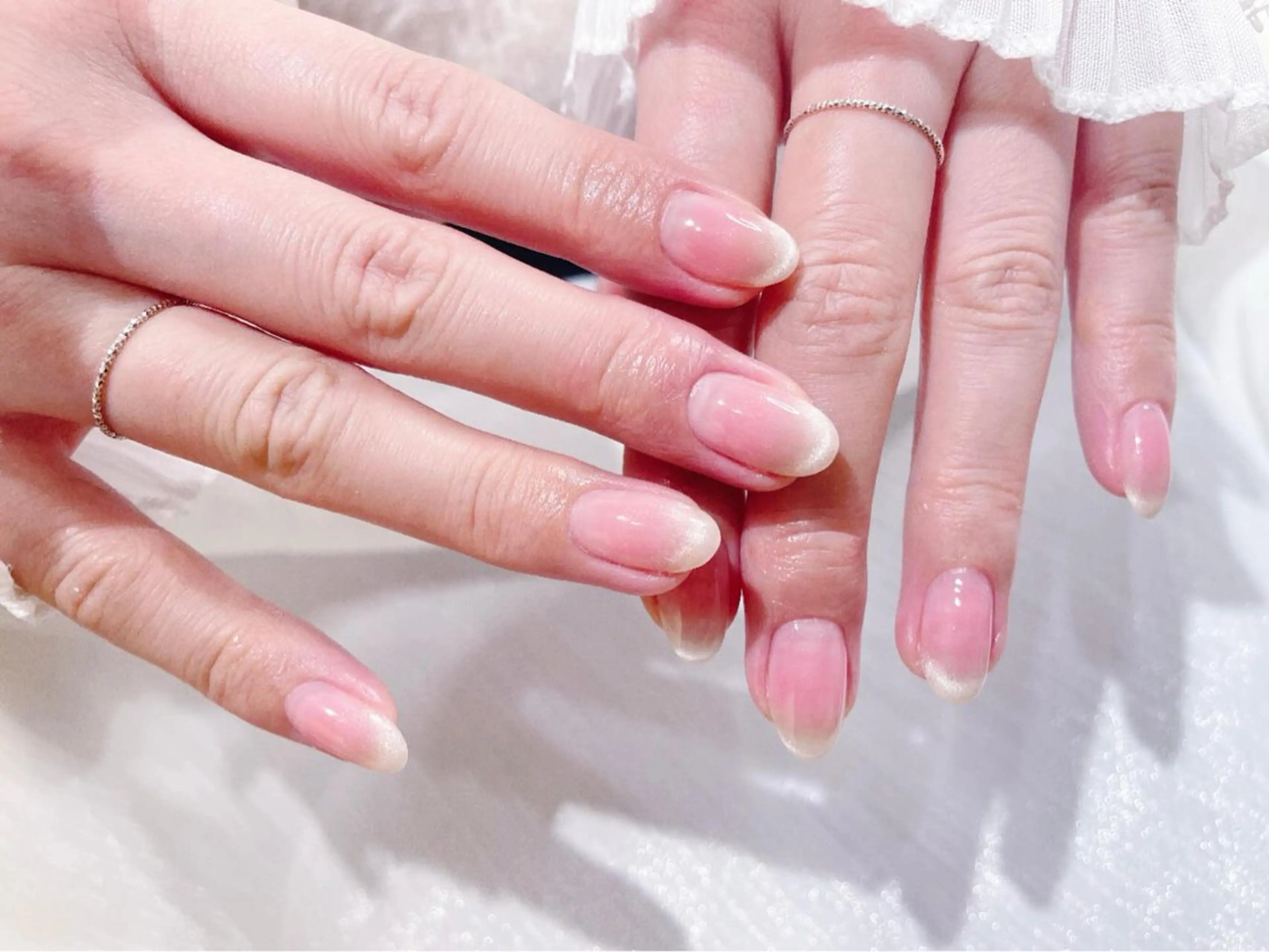 ネイル チークネイル 長さ出し フラワーネイル フレンチネイル ガーリー sun nail池袋 モデル募集のネイルデザイン