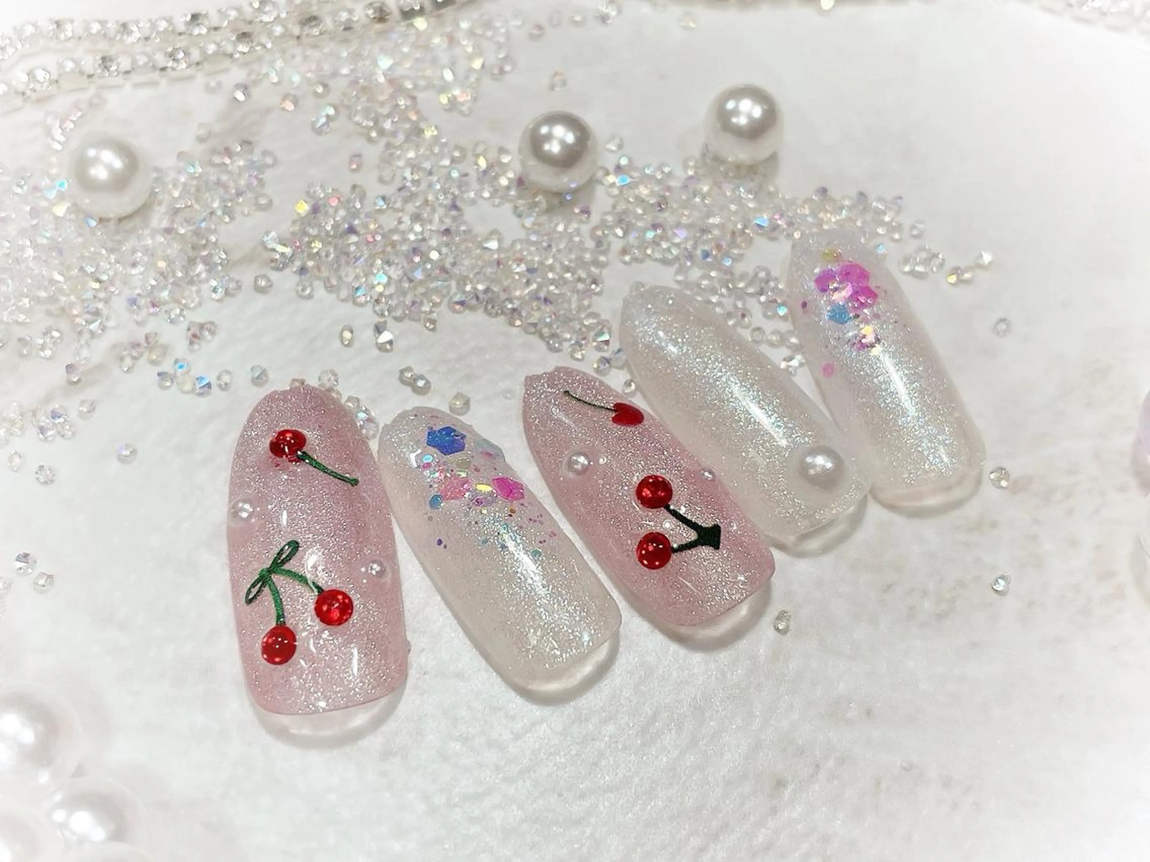 ネイル キラキラネイル ワンホンネイル ハンドネイル Cat's eye TOKYO 新宿店のネイルデザイン