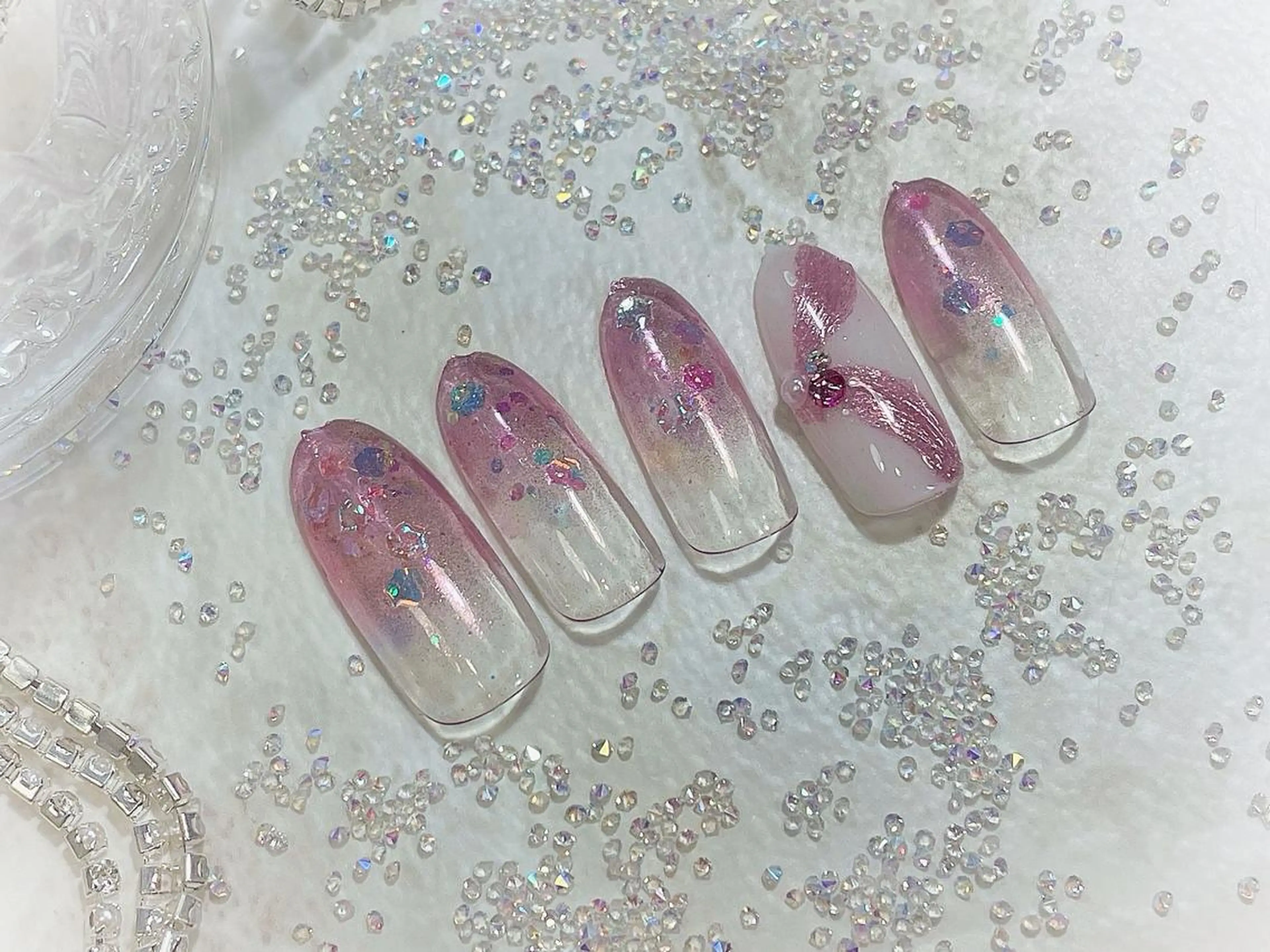 ネイル キラキラネイル ワンホンネイル ハンドネイル Cat's eye TOKYO 新宿店のネイルデザイン