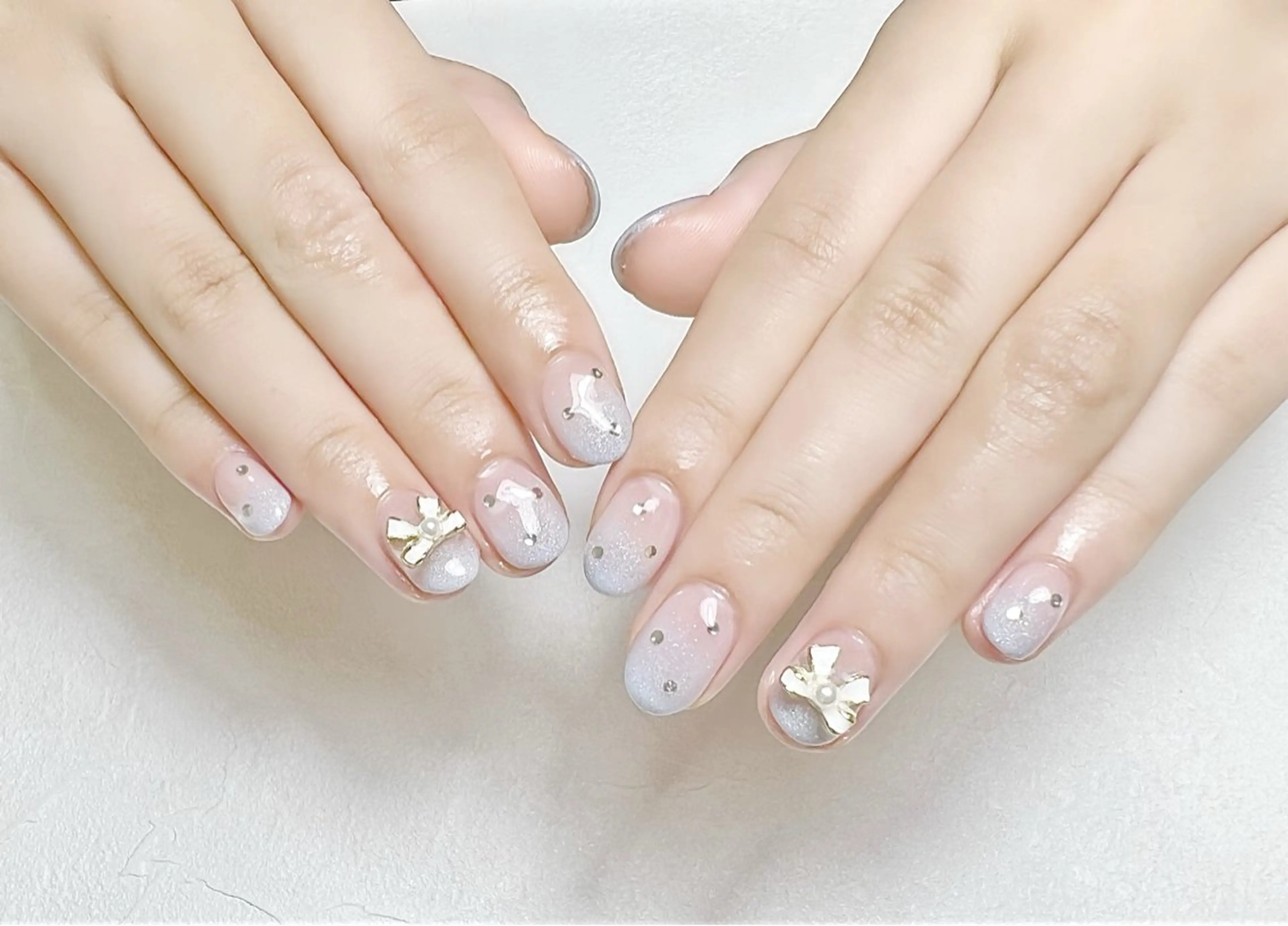 ネイル ブルー グラデーション ラメ(グリッター) ラメグラデーション リボン rouse nail RISATOのネイルデザイン
