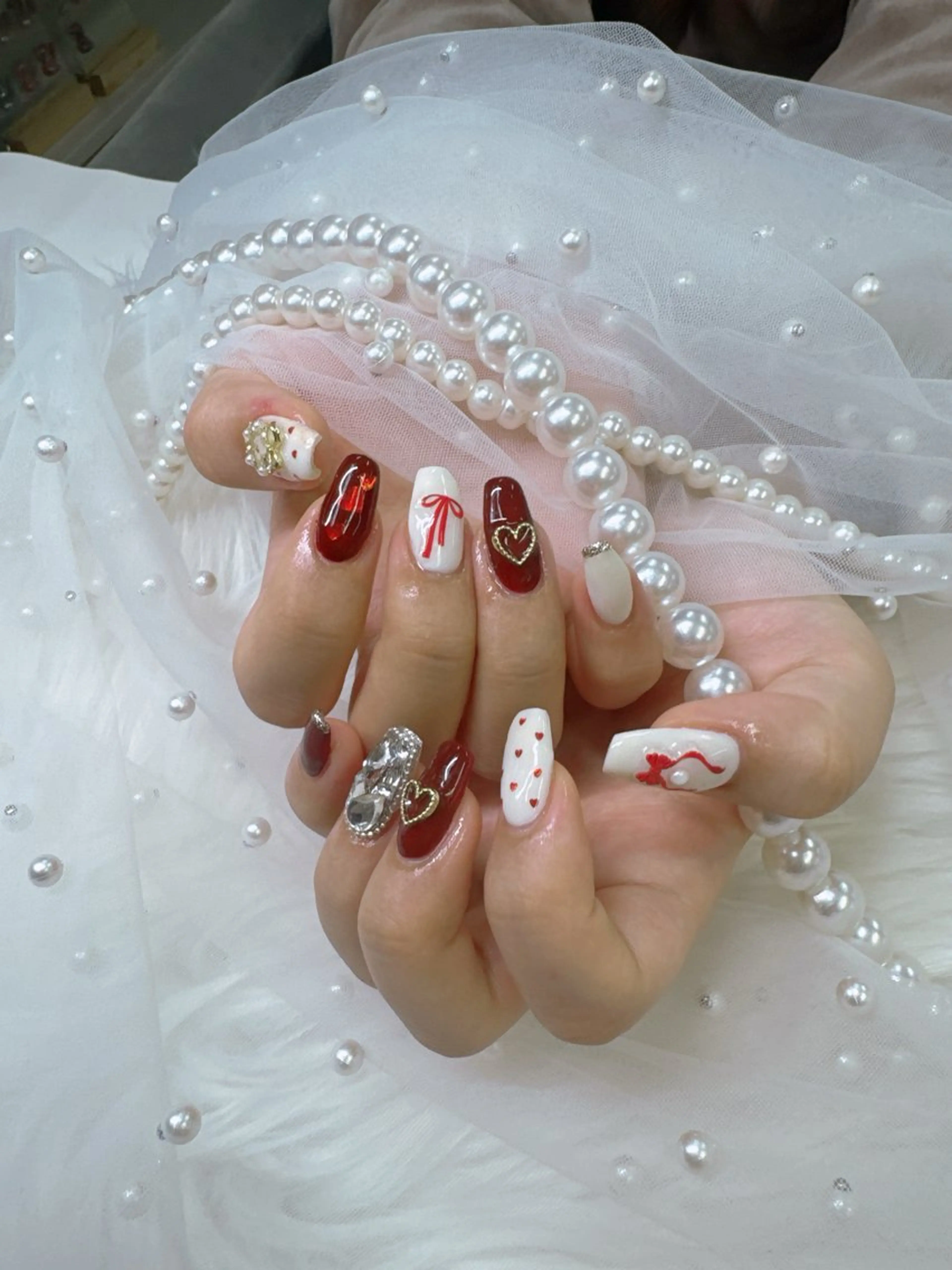 ネイル ボルドー ジェルネイル キラキラネイル ロングネイル マグネットネイル ハンドネイル Queeens nailのネイルデザイン