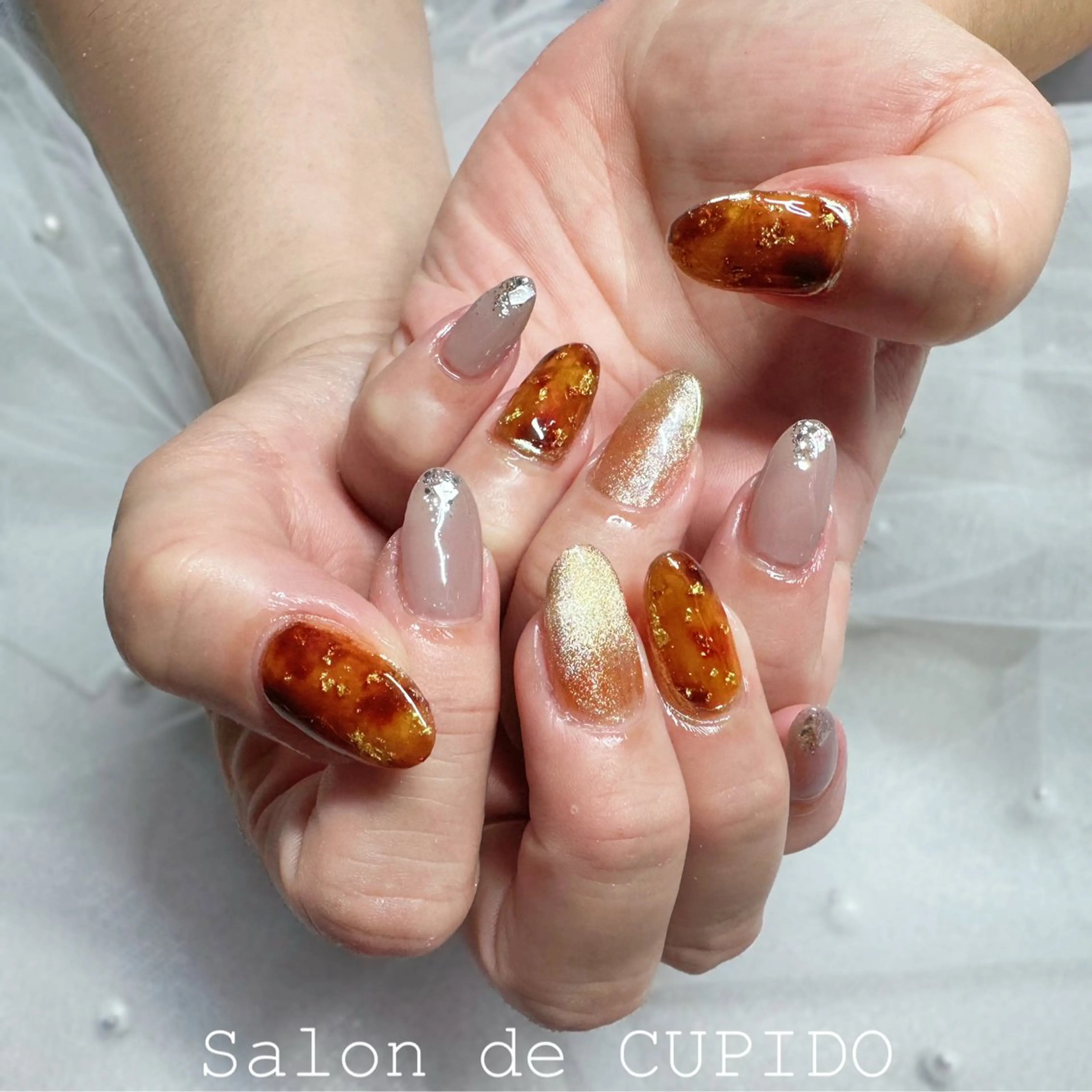 ネイル アートネイル べっ甲ネイル ブラウン マグネットネイル Salon de CUPIDOのネイルデザイン