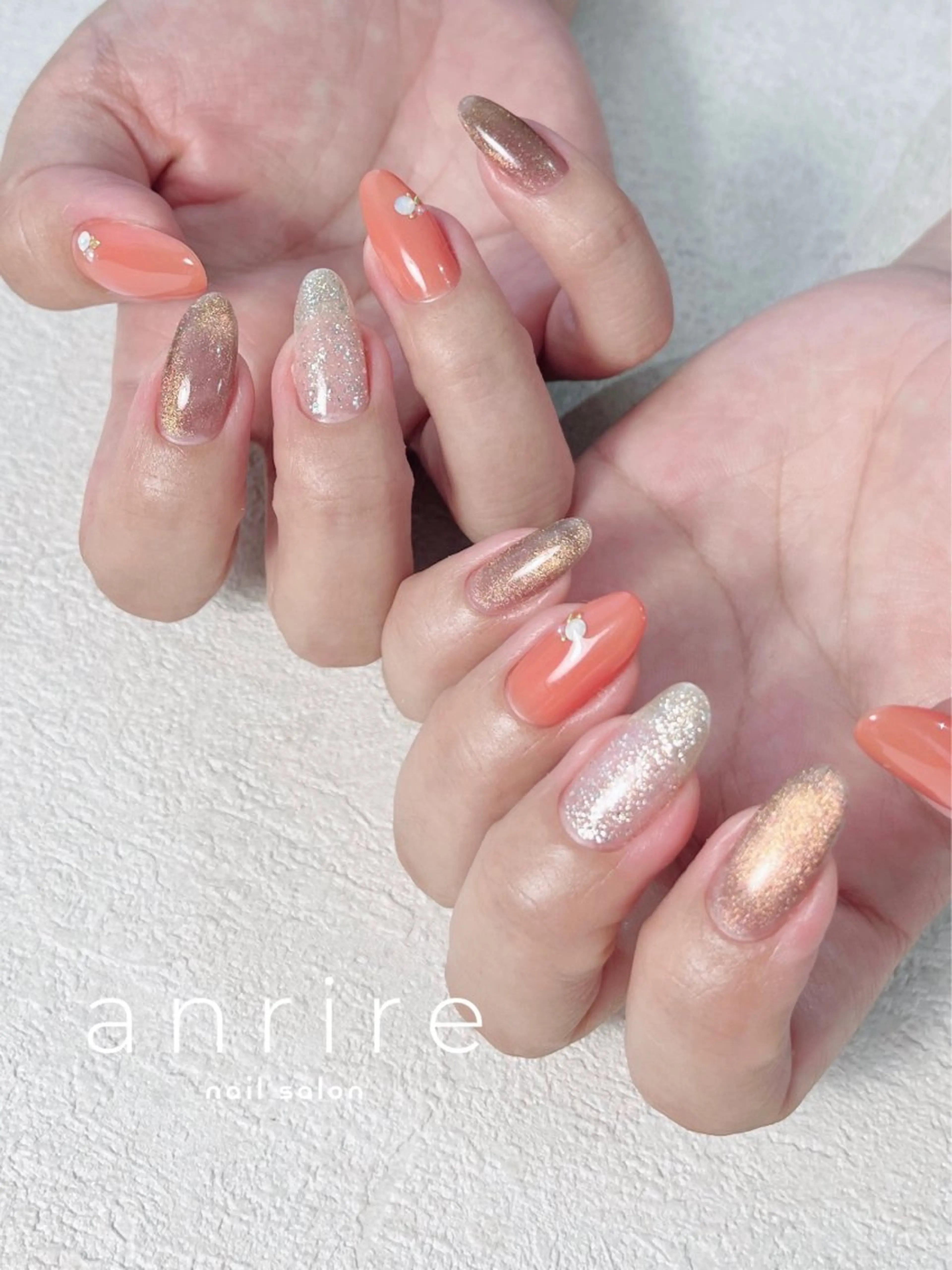 ネイル ジェルネイル キラキラネイル ラメ(グリッター) マグネットネイル オレンジ ハンドネイル nail salon anrire〜アンリール〜所属・nailsalon anrireのネイルデザイン