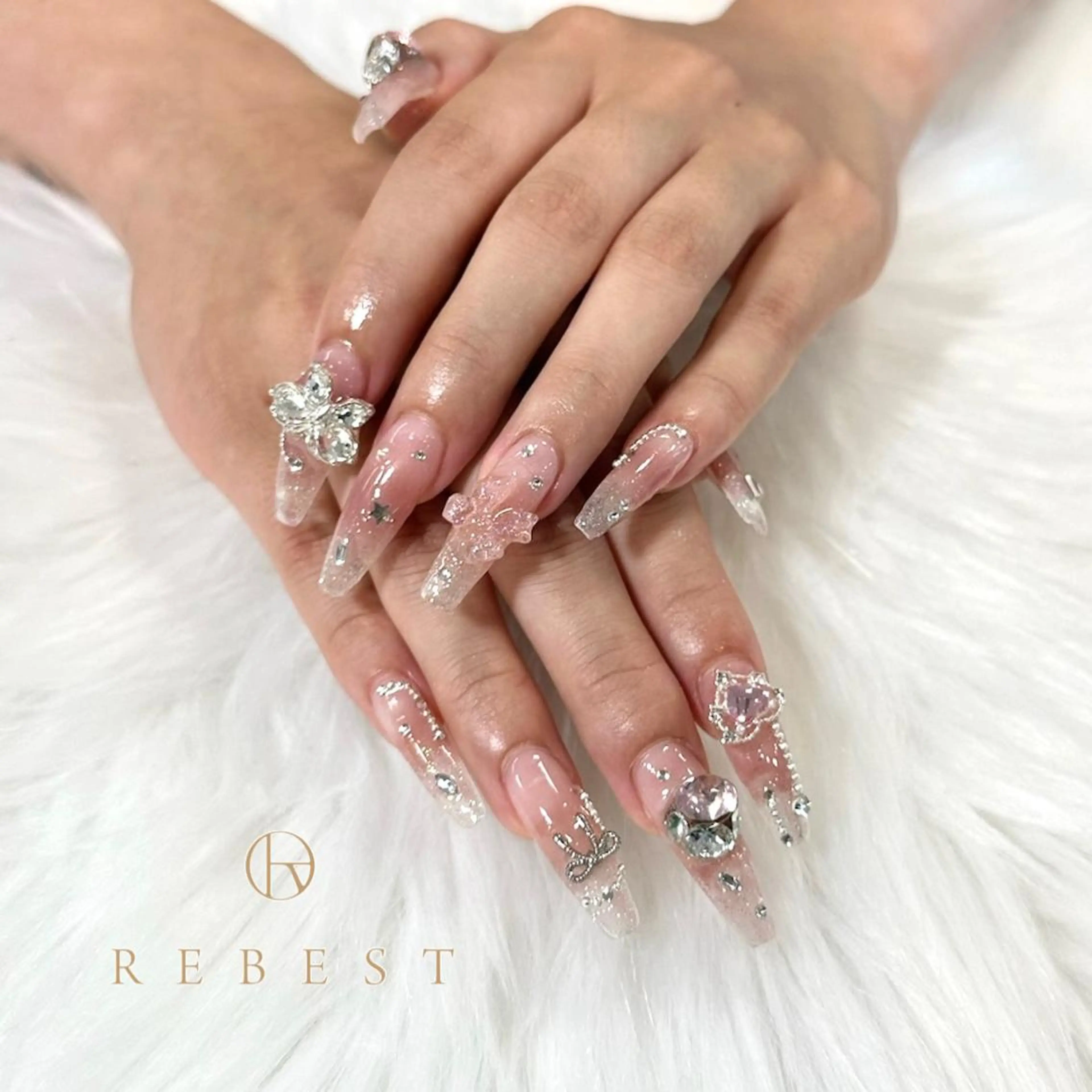 ネイル ❤️💛REBEST 京橋店のネイルデザイン