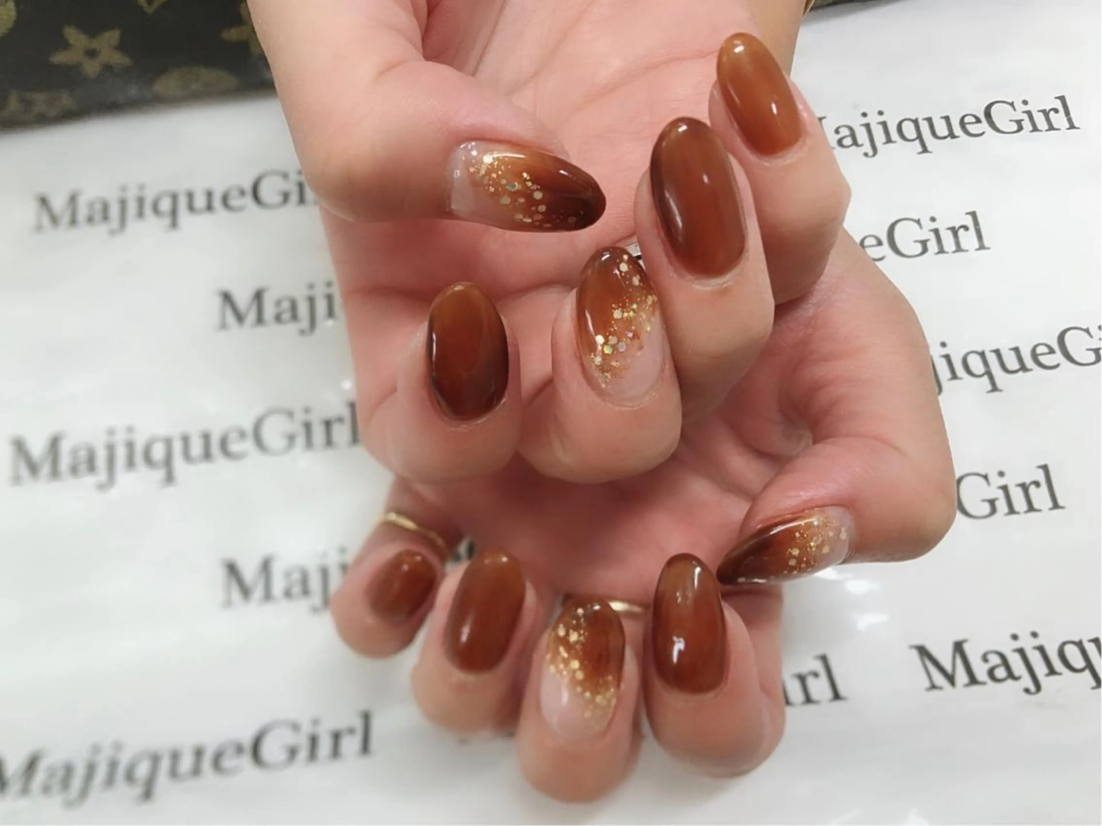 ネイル ホログラムネイル オレンジ 冬ネイル 🌸Nail&Eye KAKU🌸のネイルデザイン