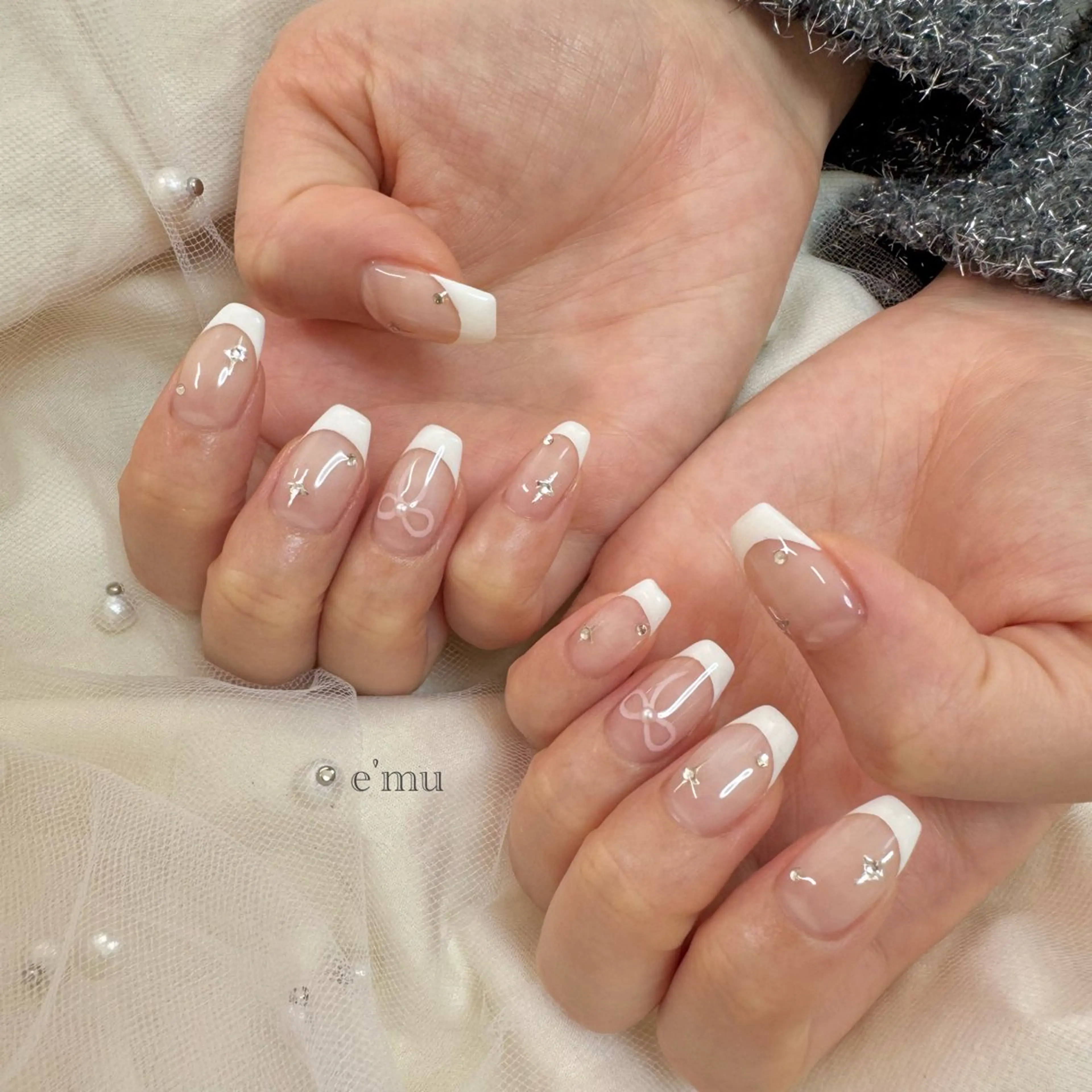 ネイル フレンチネイル リボン ハンドネイル nail salon e'mu💐のネイルデザイン