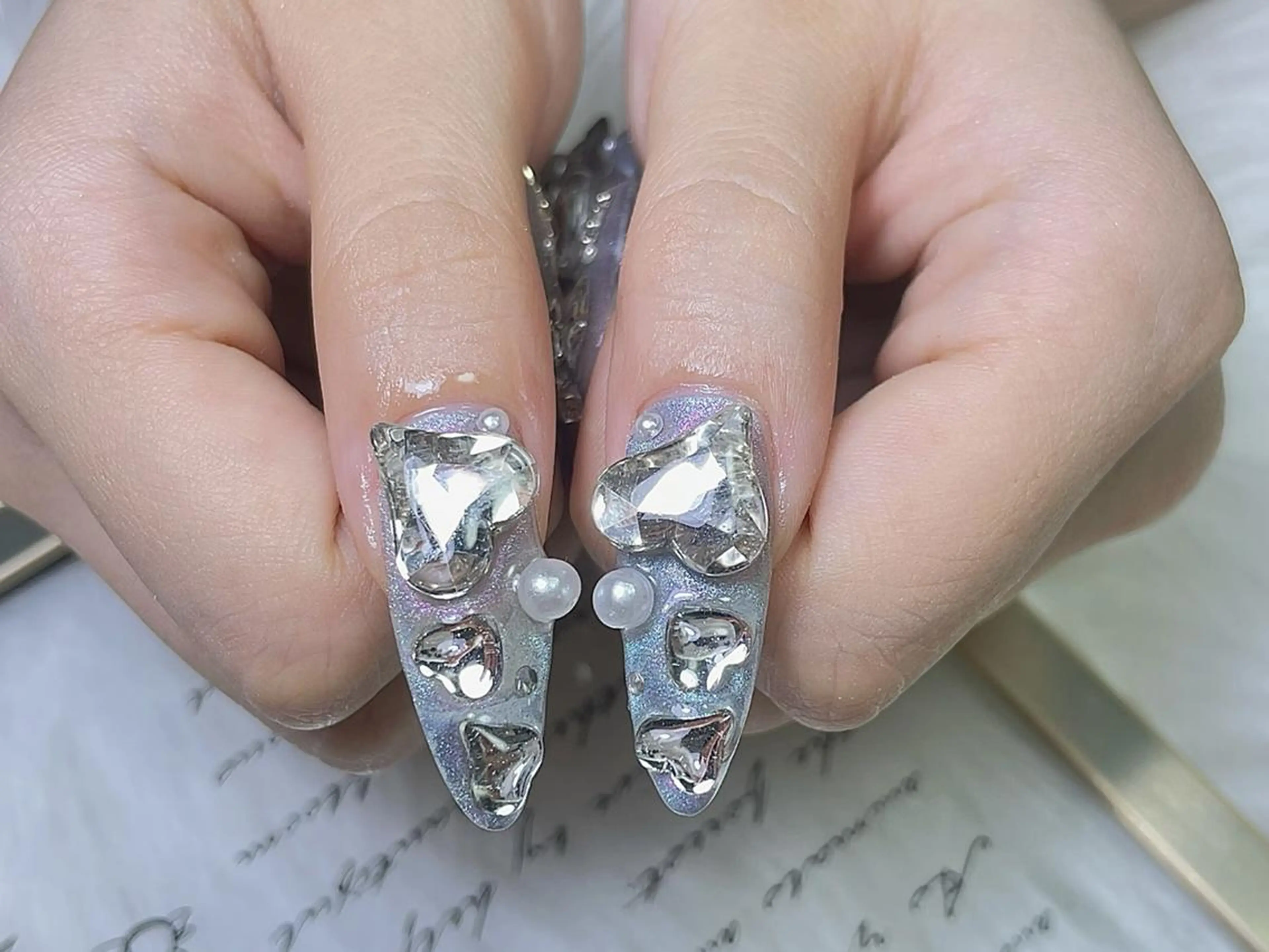 ネイル ジェルネイル キラキラネイル 韓国ネイル ラメ(グリッター) マグネットネイル One plus StudioNailのネイルデザイン