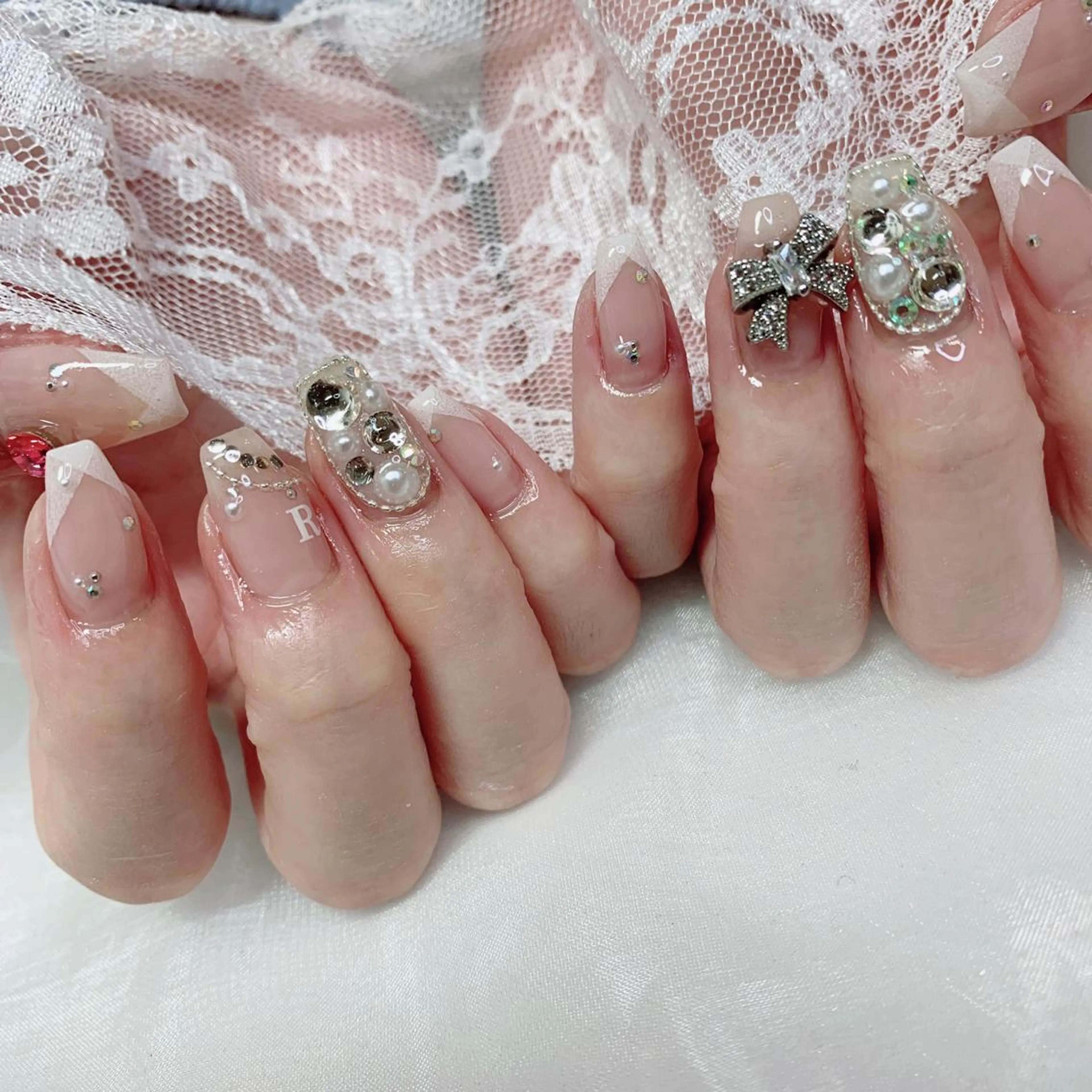 ネイル リボン ハンドネイル La neige* yuki 🐩🌙のネイルデザイン