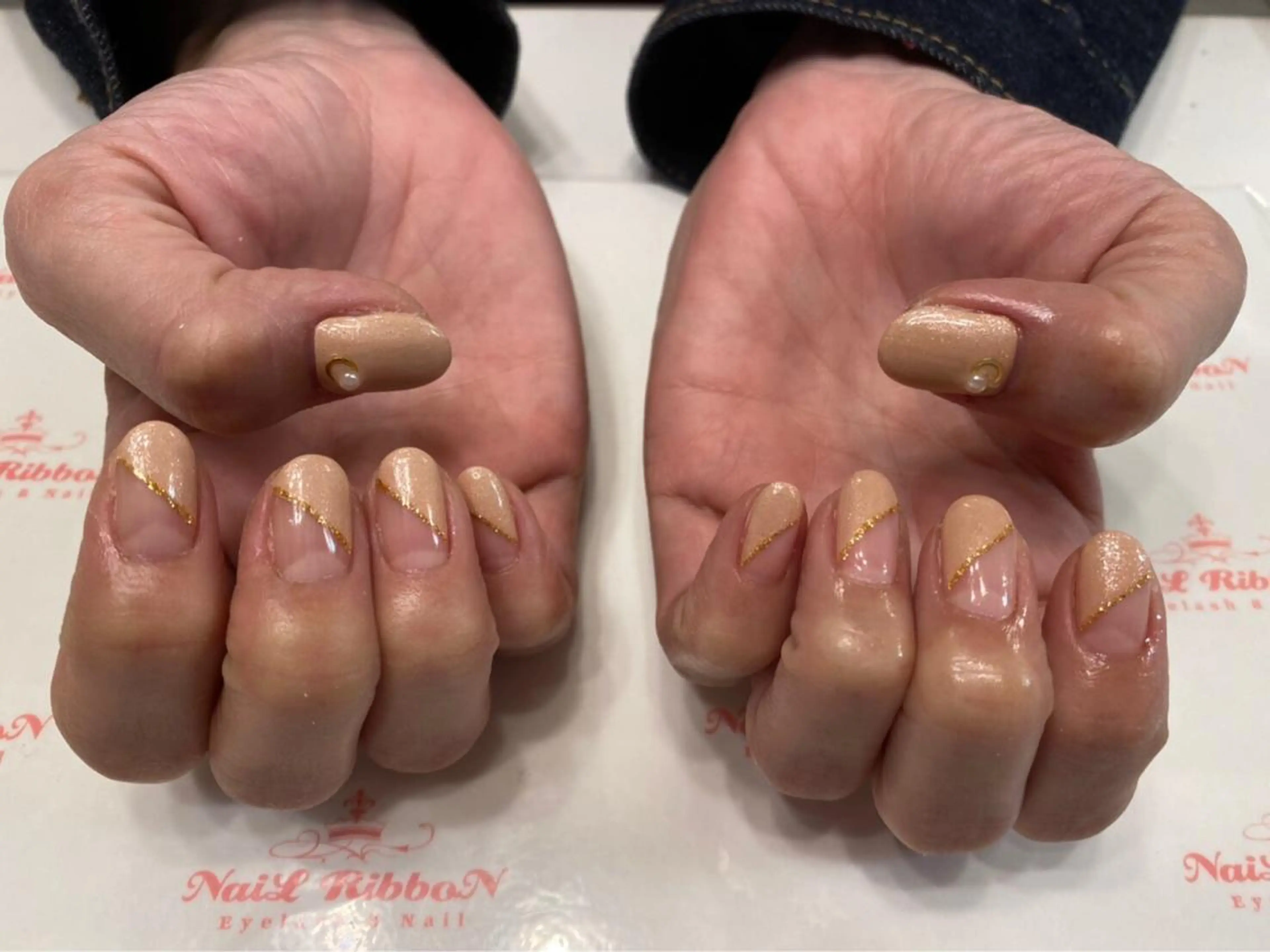 ネイル 春ネイル ネイルリボン 受付スタッフのネイルデザイン