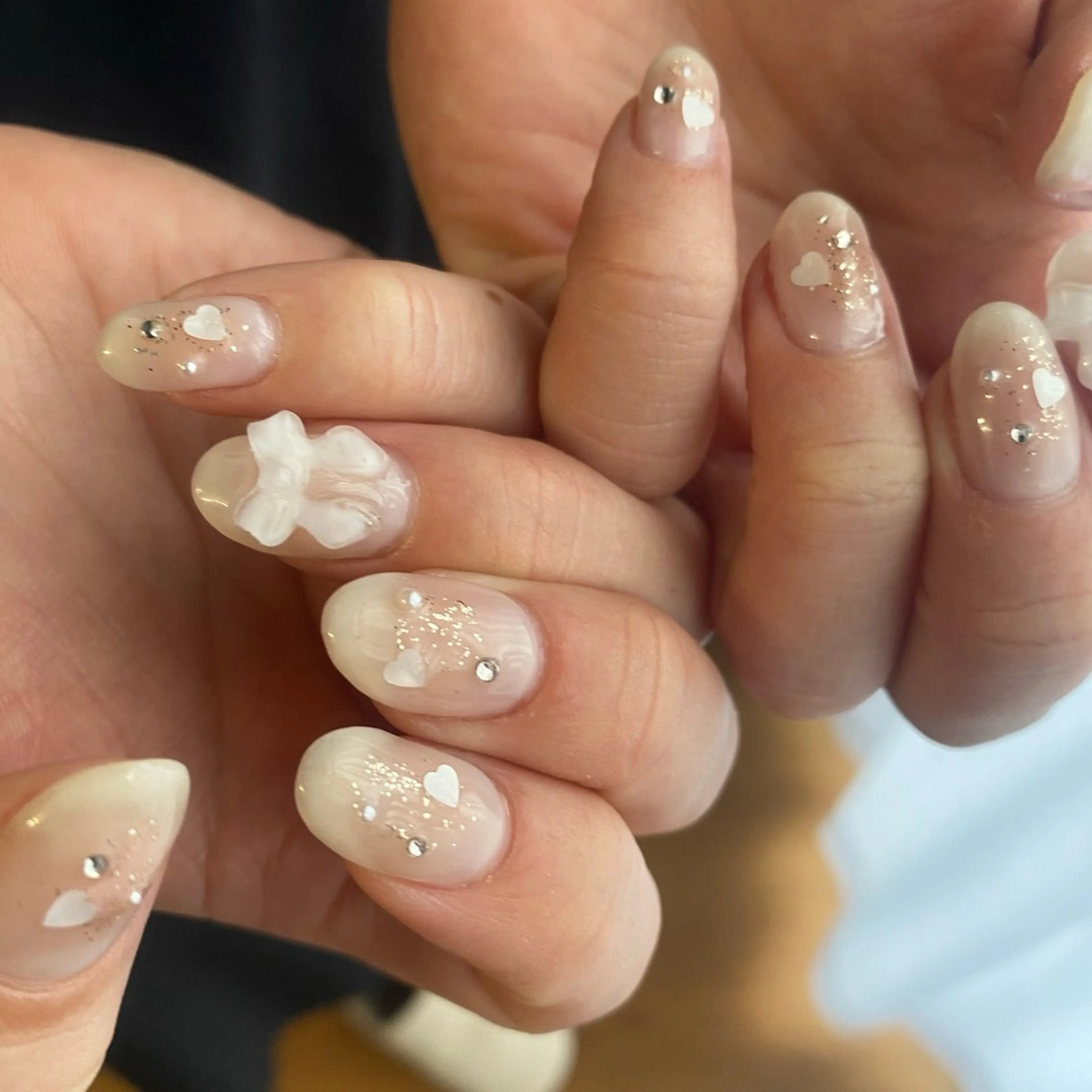 ネイル チークネイル ニュアンスネイル リボン máni hazukiのネイルデザイン