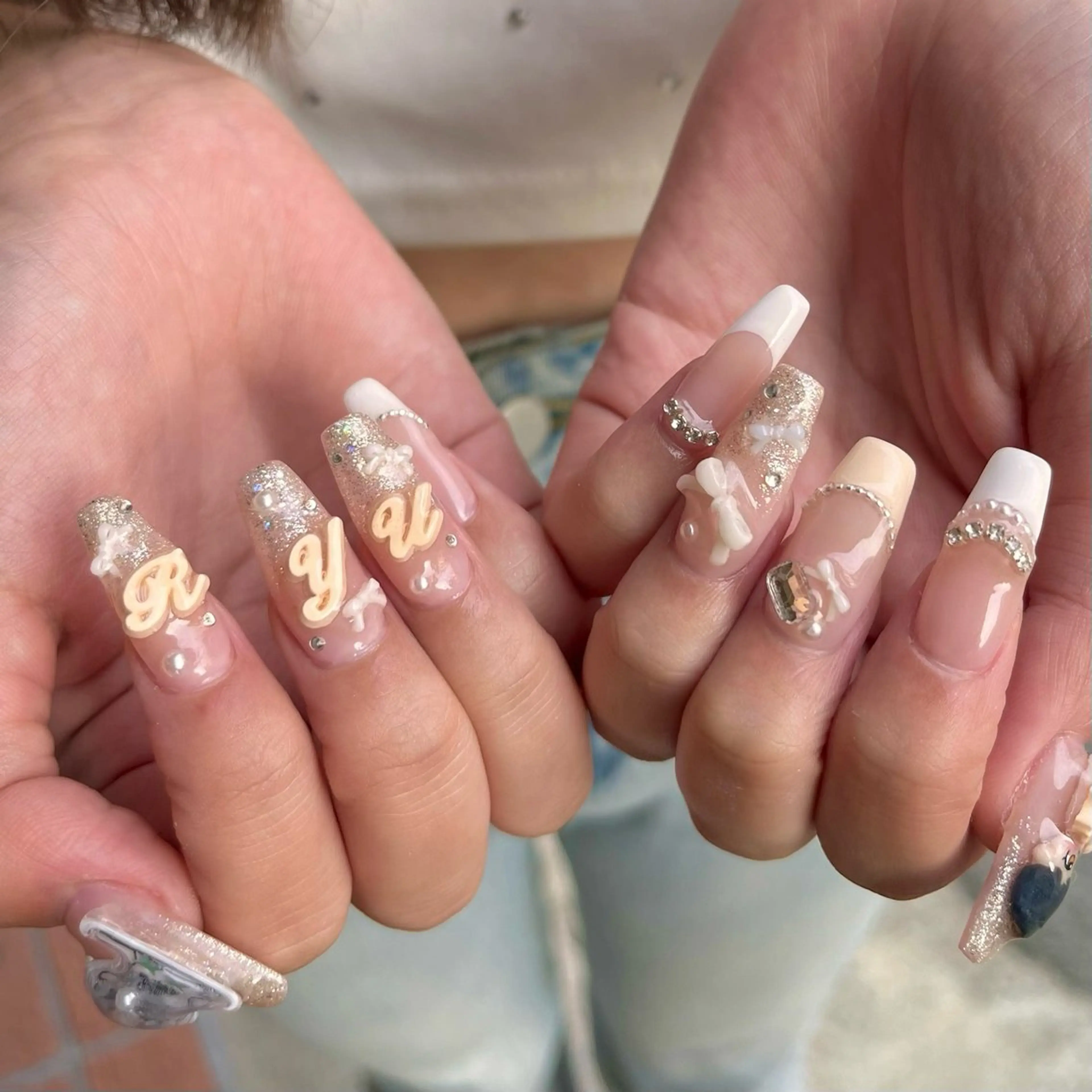 ネイル キラキラネイル リボン ハンドネイル ballie／小野原 なつみのネイルデザイン