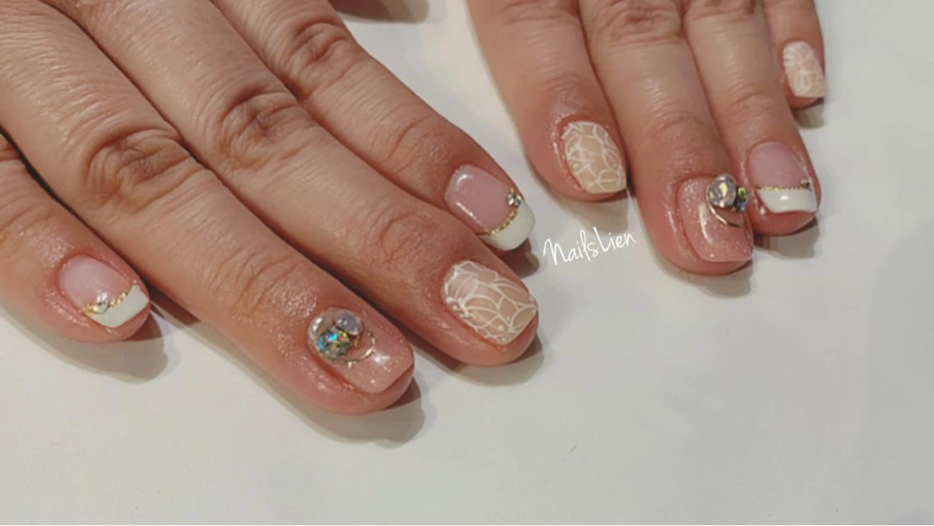 ネイル フラワーネイル フレンチネイル 春ネイル studio e n / RiNのネイルデザイン