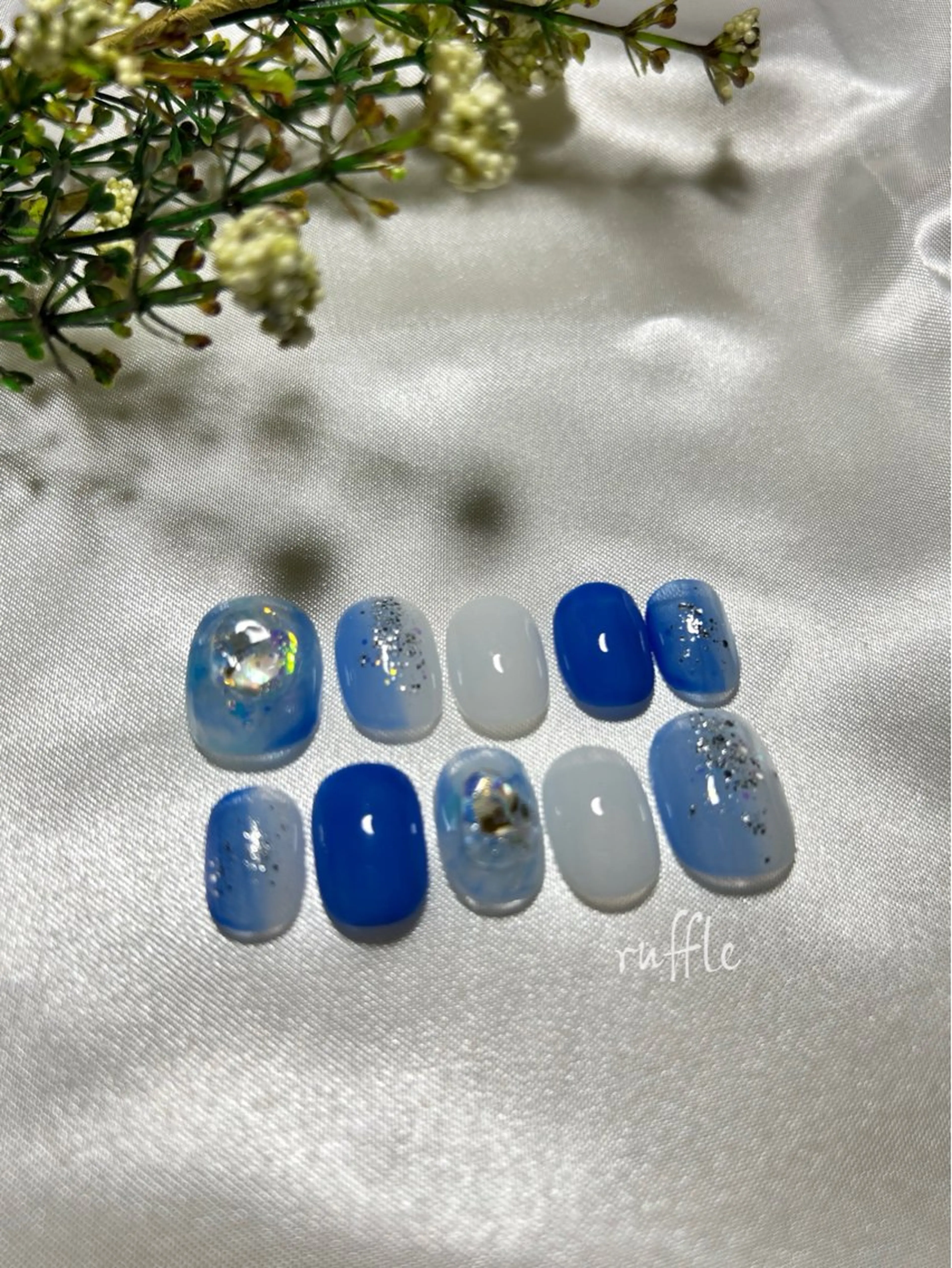 ネイル オーロラネイル ブルー ラメ(グリッター) 夏ネイル ruffle Asukaのネイルデザイン