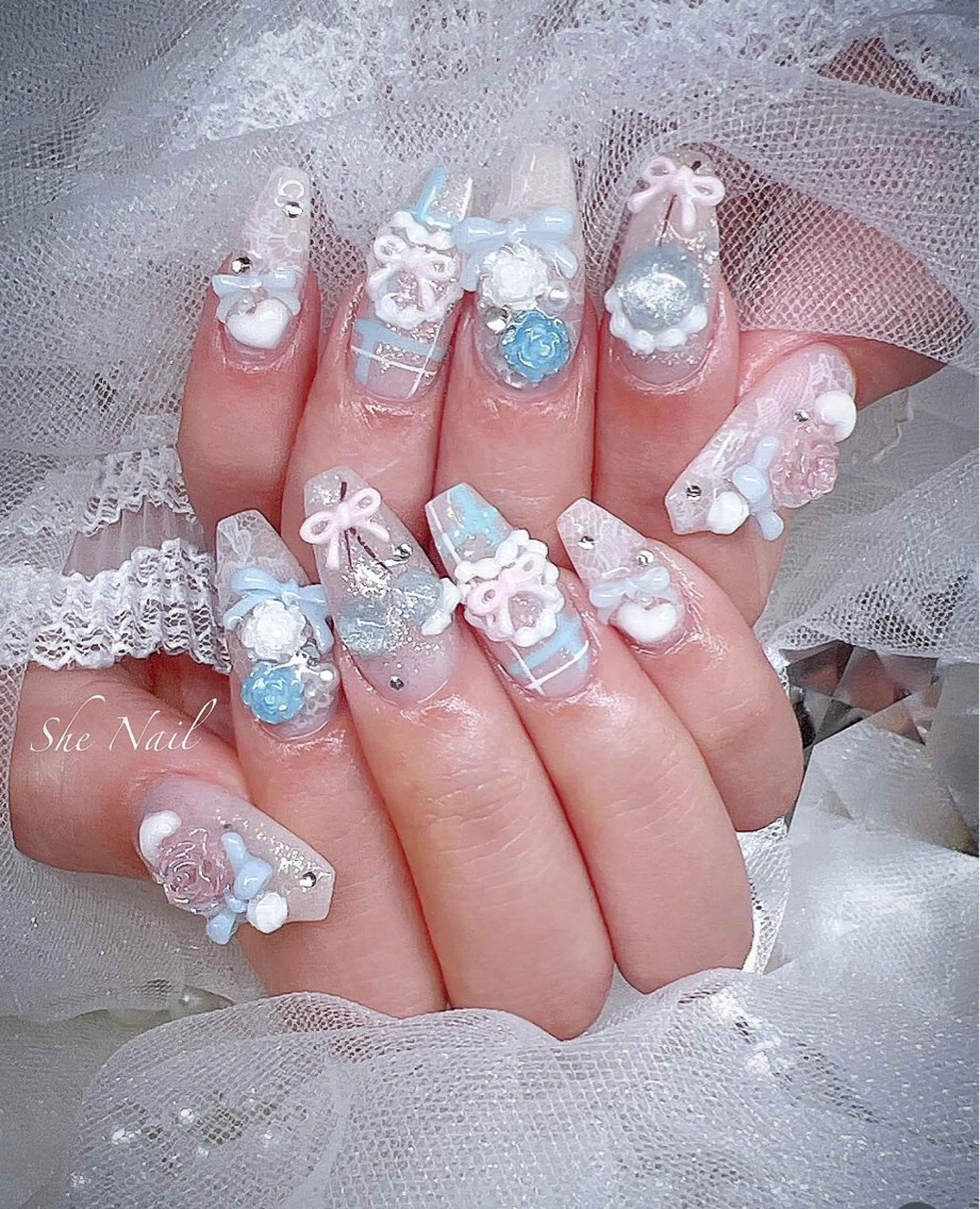 ネイル 水色 春ネイル ワンホンネイル ISA_ BELLAのネイルデザイン