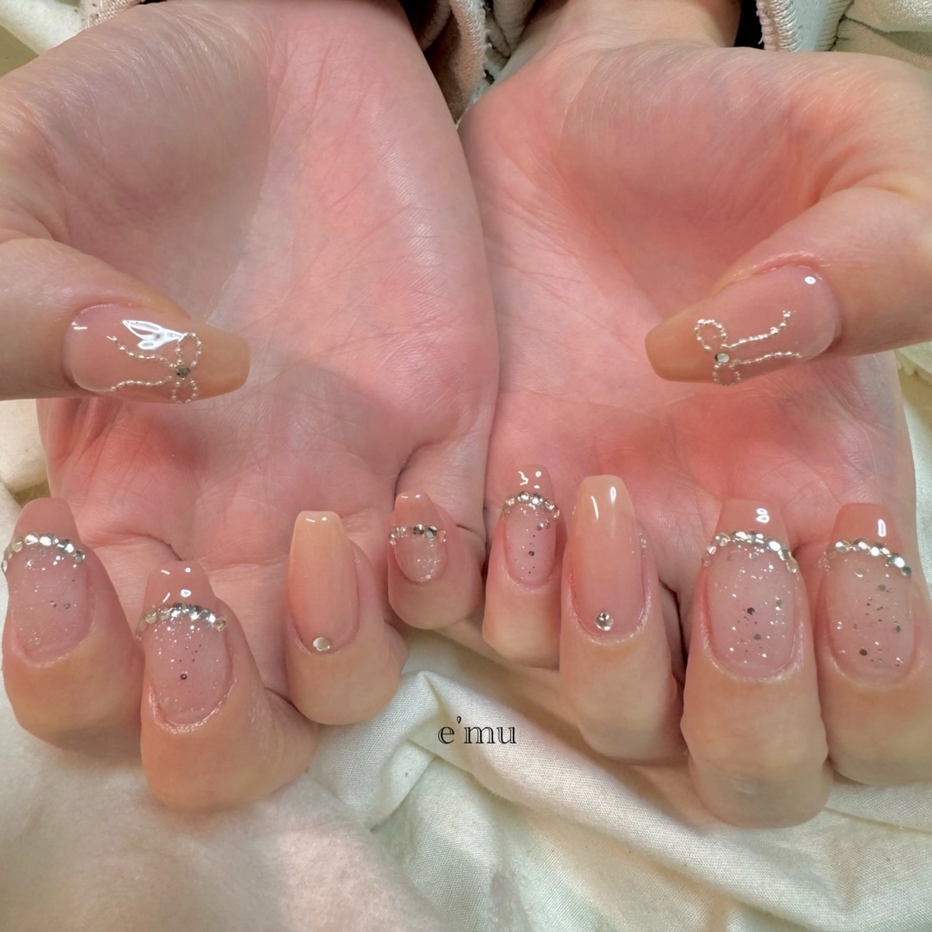 ネイル オレンジ リボン ハンドネイル nail salon e'mu💐のネイルデザイン