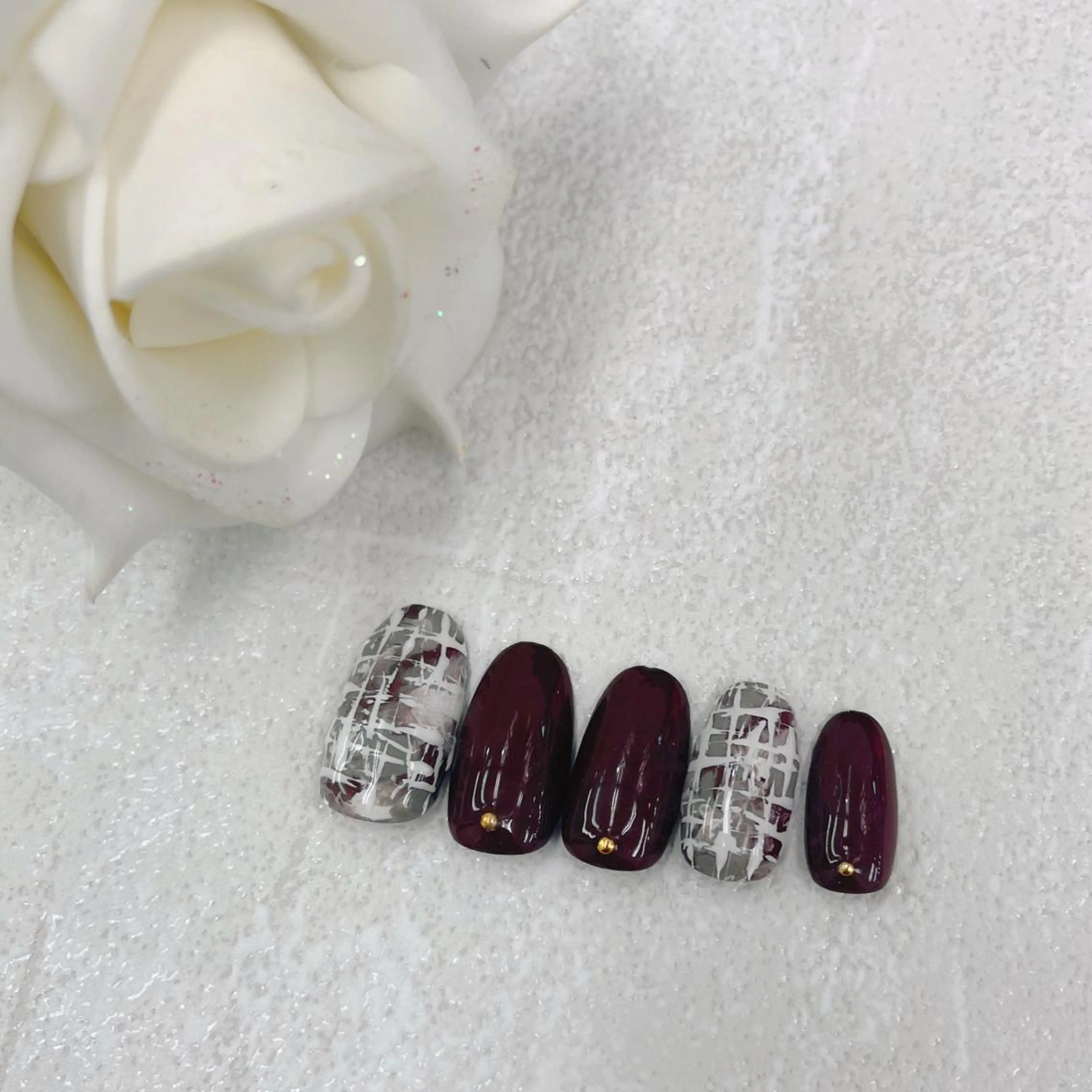 ネイル ツイードネイル 冬ネイル BlueDaisy 栄本店のネイルデザイン