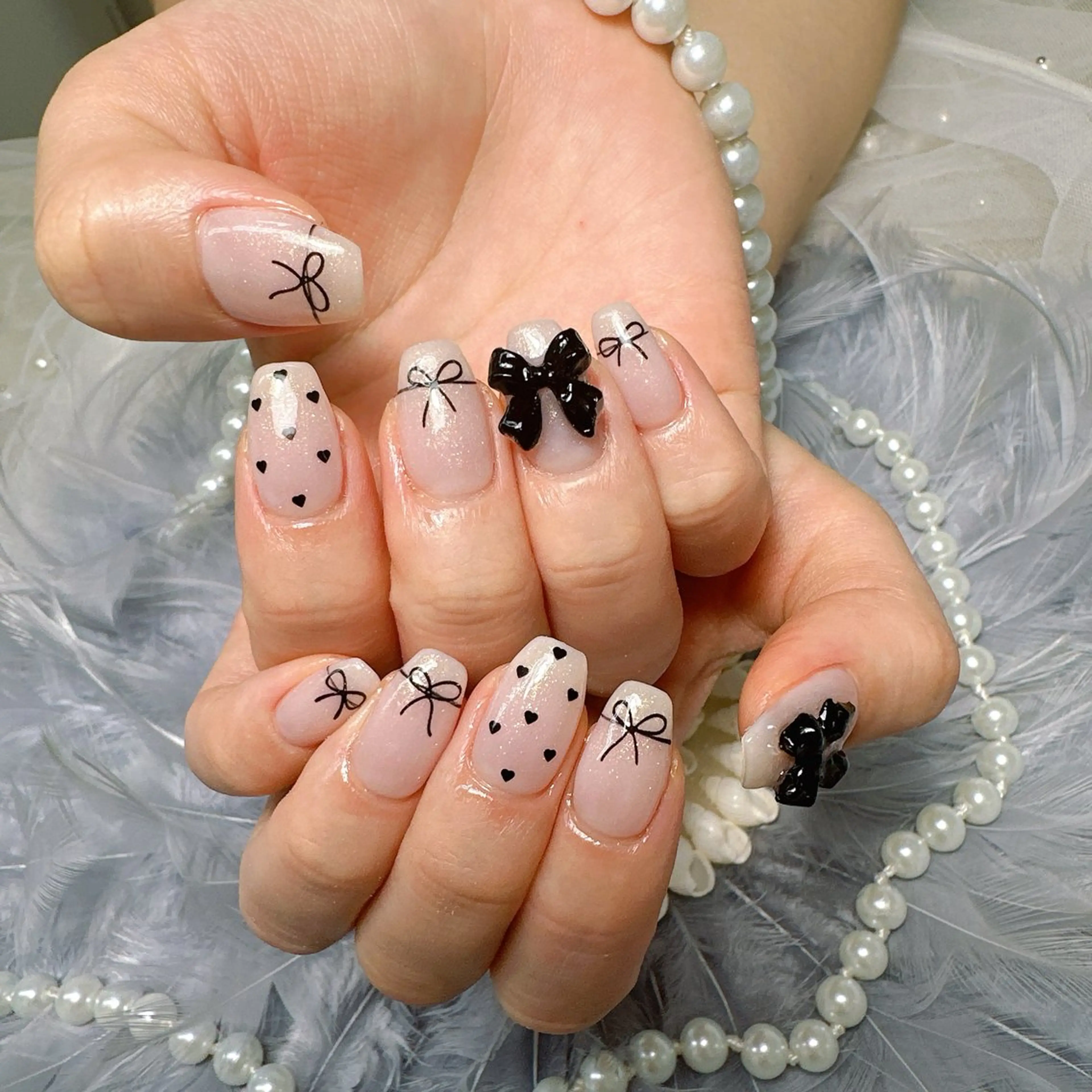 ネイル ハート リボン ハンドネイル Pretty Nail Salonのネイルデザイン