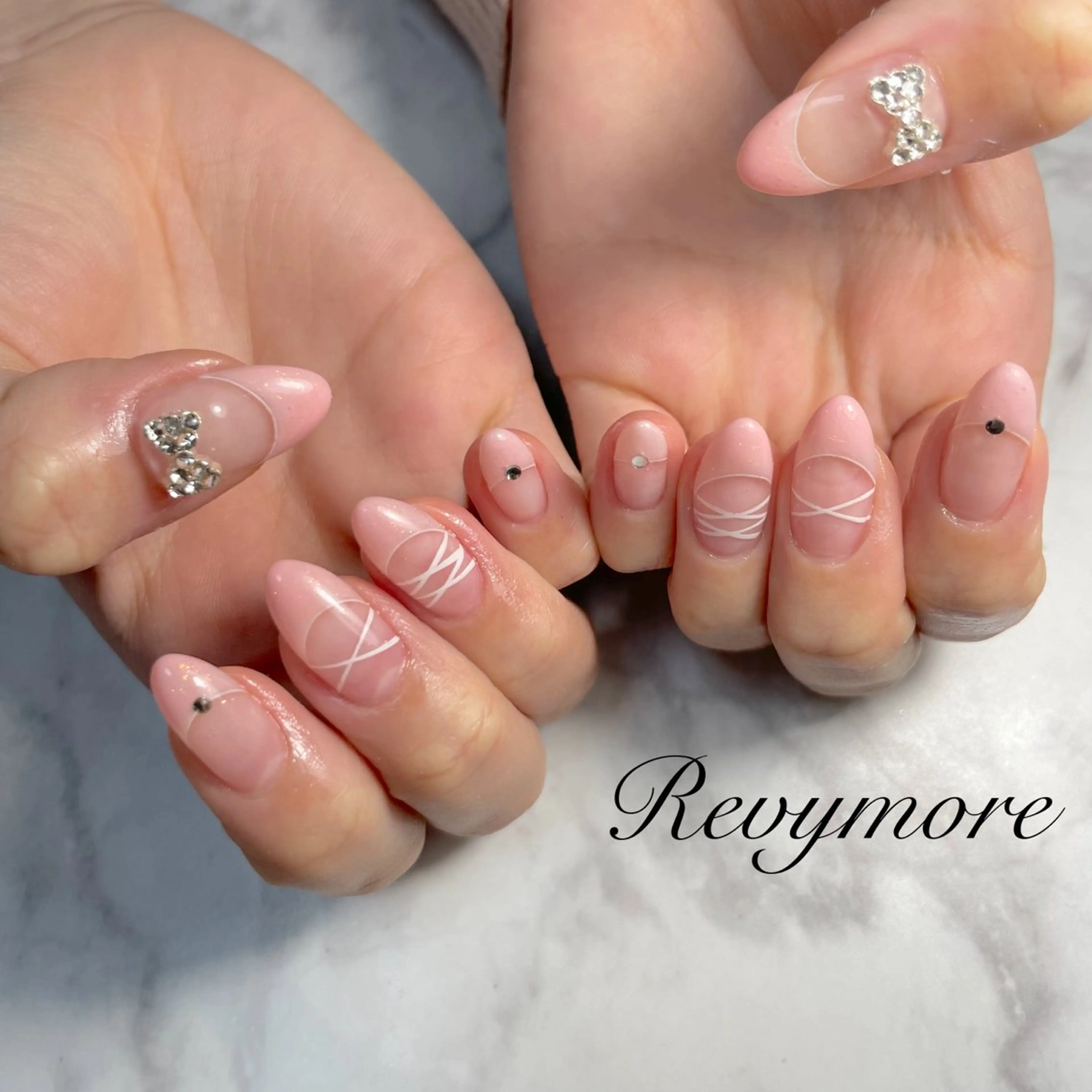 ネイル フレンチネイル ジェルネイル キラキラネイル 韓国ネイル ニュアンスネイル nail salon Revymoreのネイルデザイン