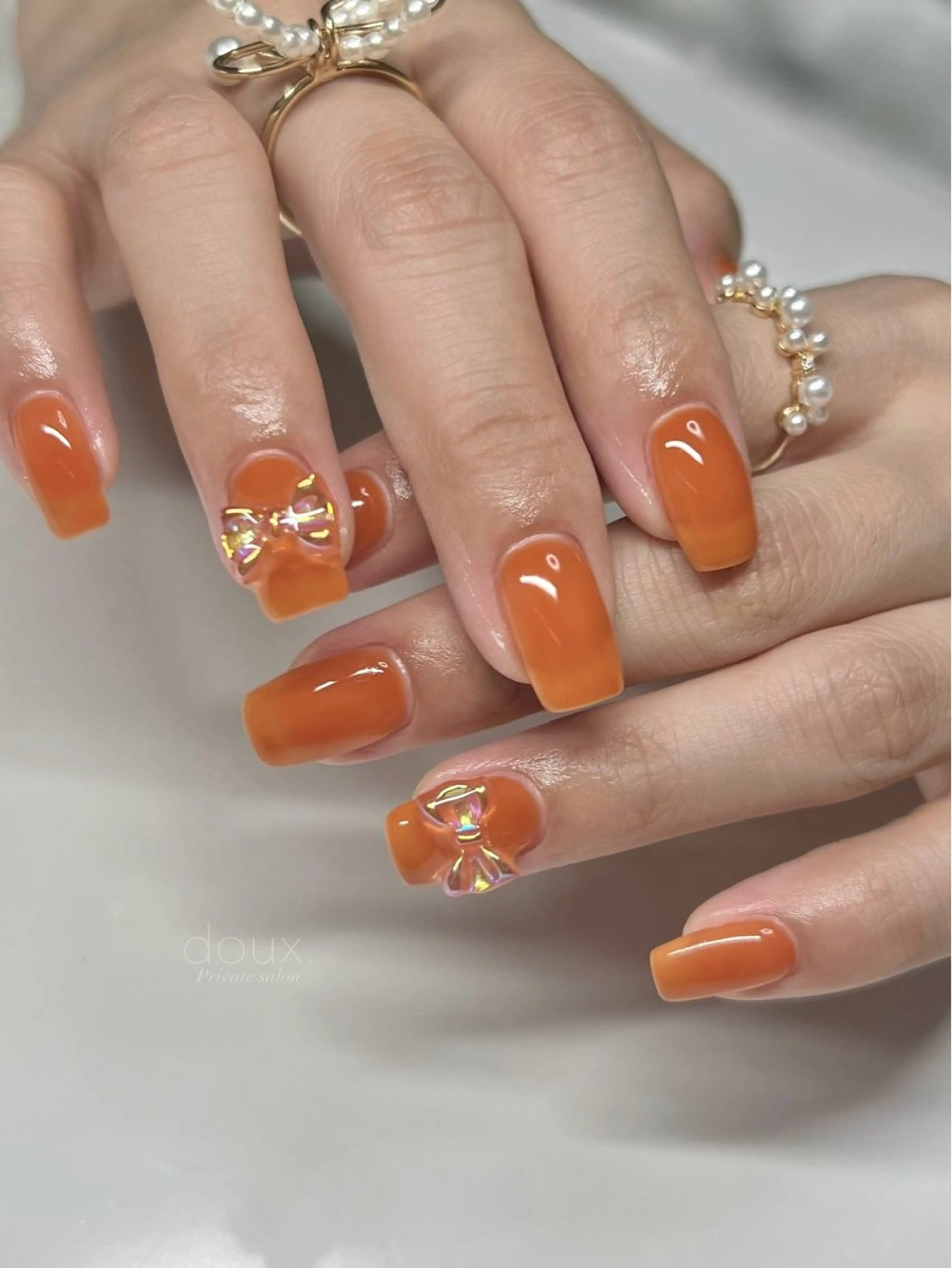 ネイル オーロラネイル 韓国ネイル ニュアンスネイル ワンカラーネイル リボン ハンドネイル doux. nailのネイルデザイン
