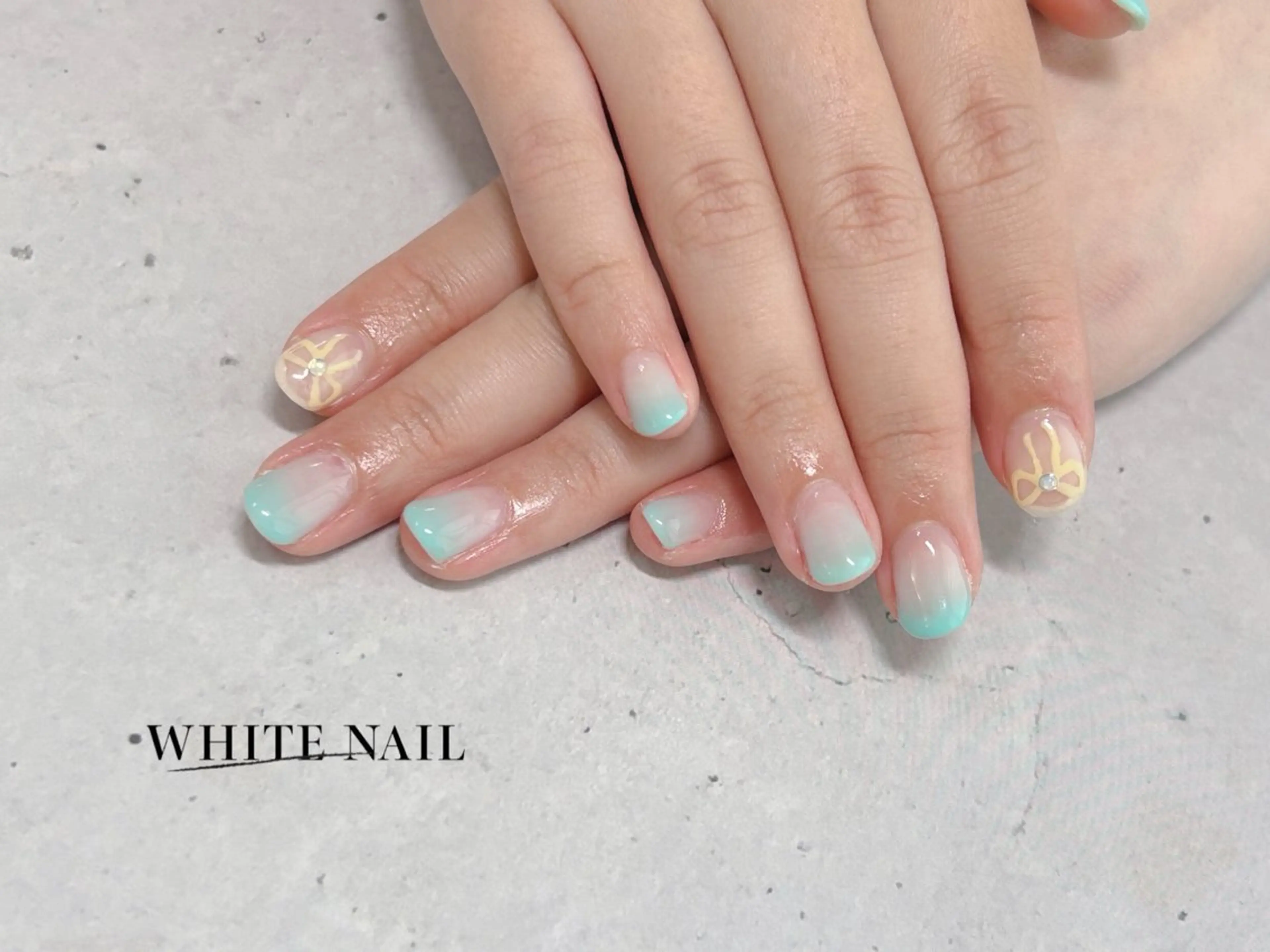 ネイル リボン ハンドネイル WHITE NAIL ホワイトネイルのネイルデザイン