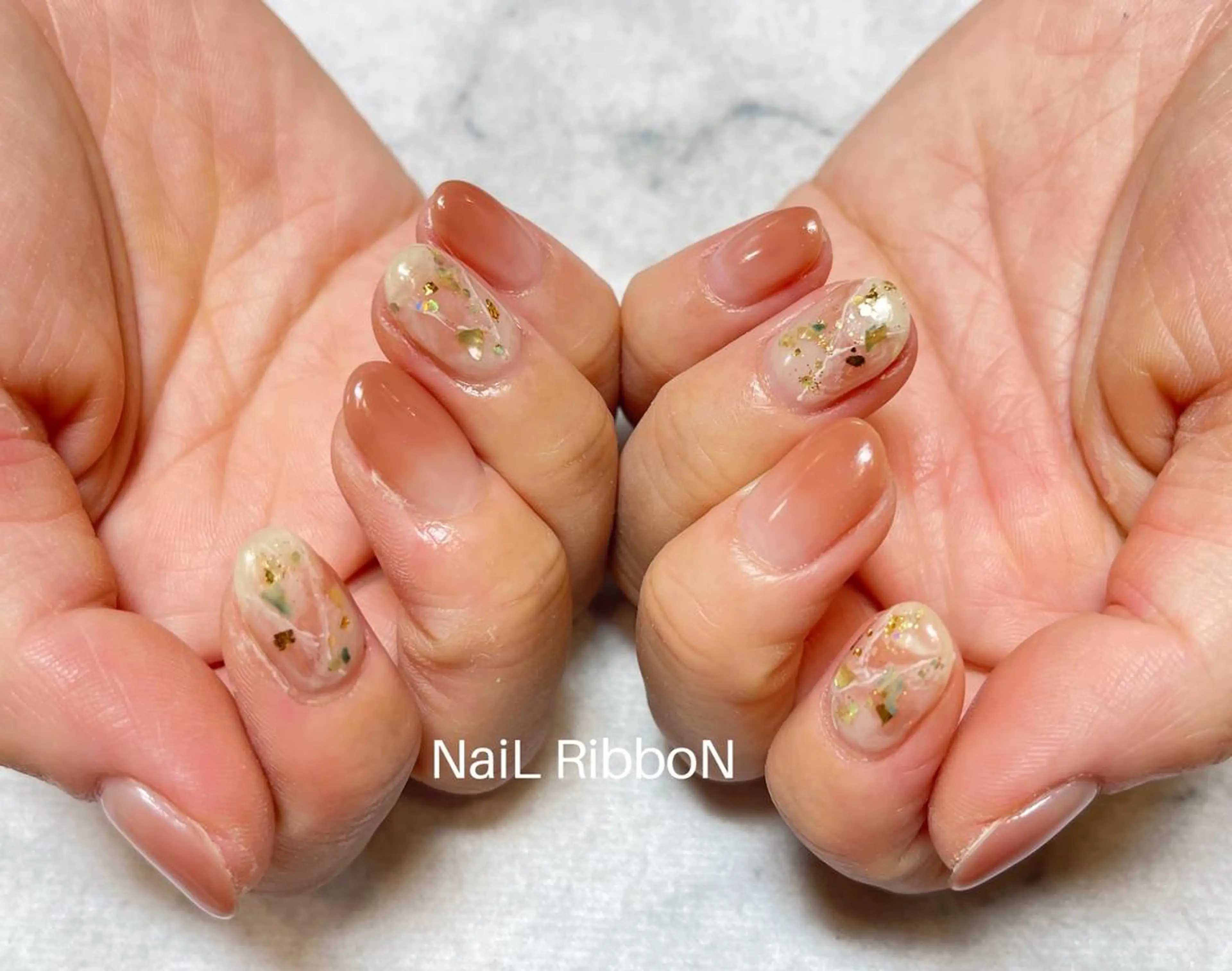 ネイル ネイルリボン 受付スタッフのネイルデザイン