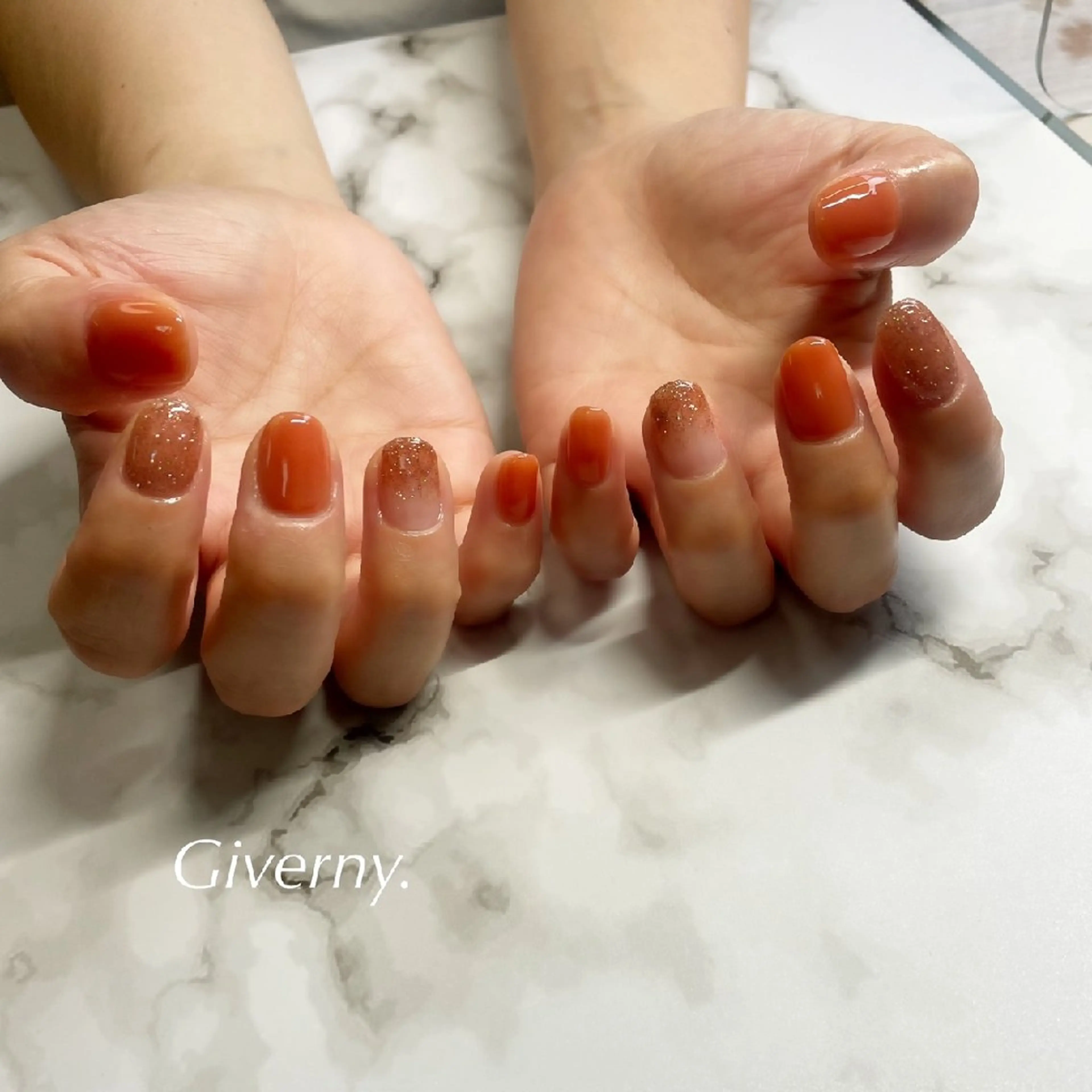 ネイル ラメ(グリッター) ワンカラーネイル オレンジ ハンドネイル Giverny .のネイルデザイン