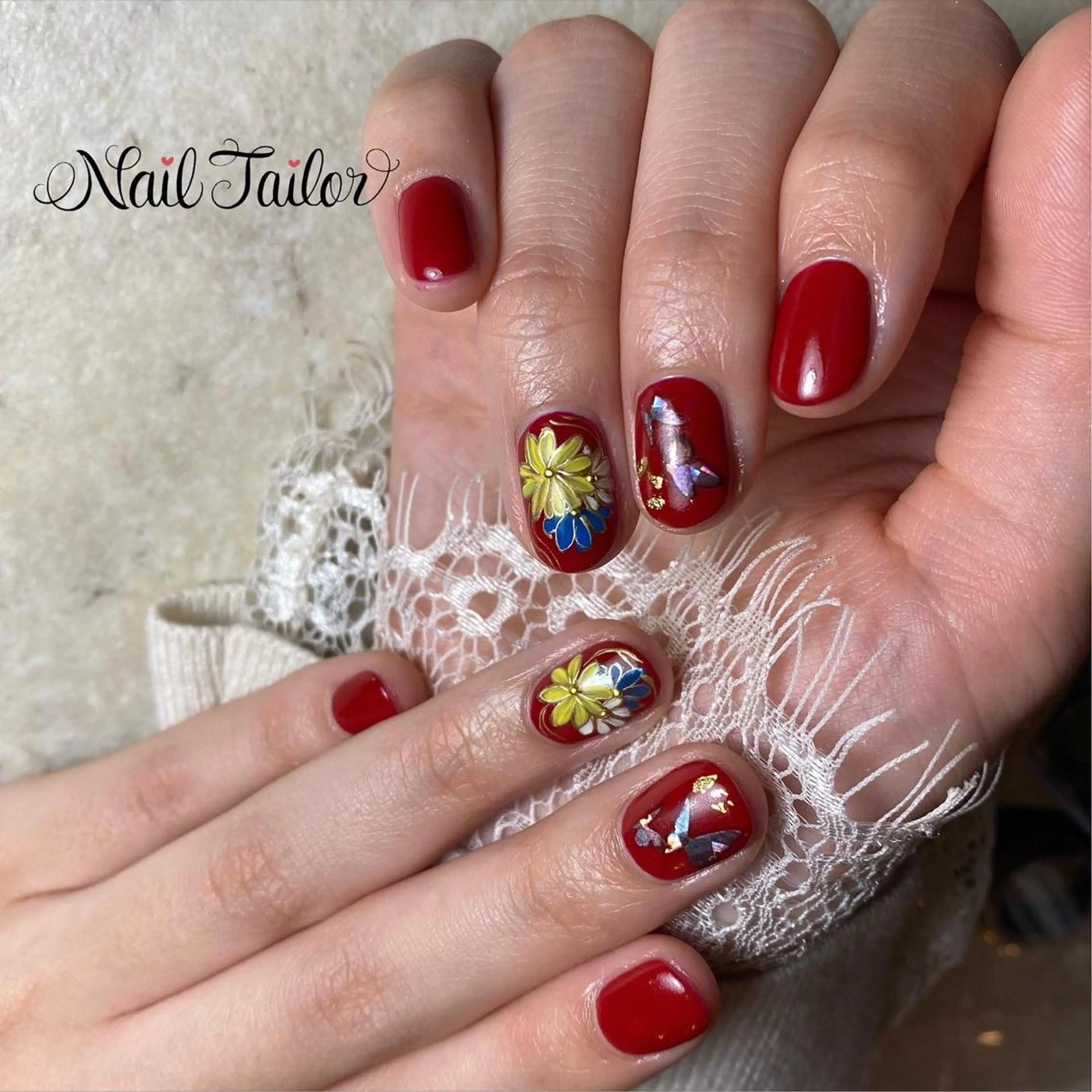 ネイル アートネイル 成人式 フラワーネイル 赤色 〜Nail Tailor〜 ネイルテイラー所属・NailTailor ネイルテイラーのネイルデザイン