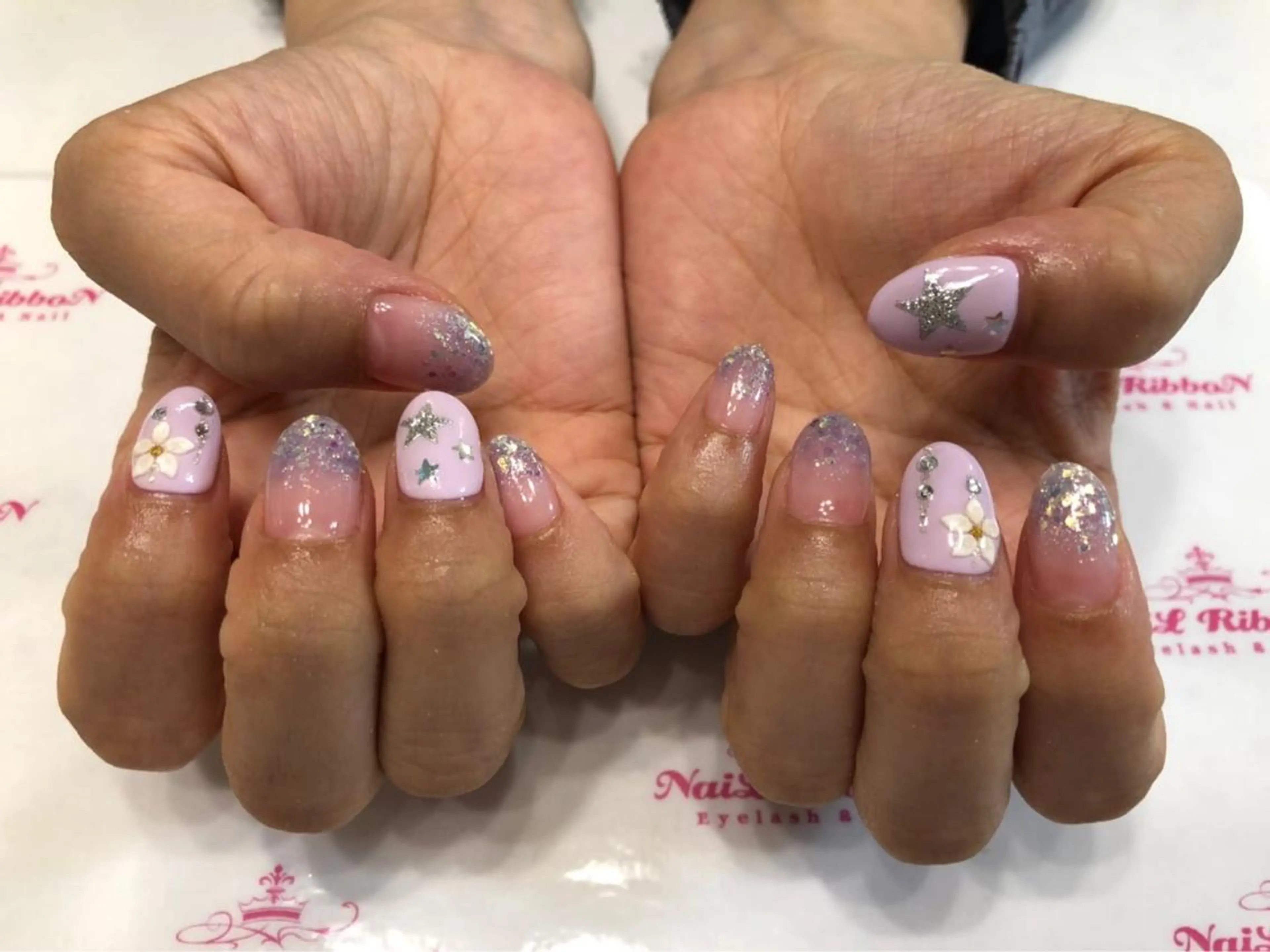 ネイル 春ネイル ネイルリボン 受付スタッフのネイルデザイン