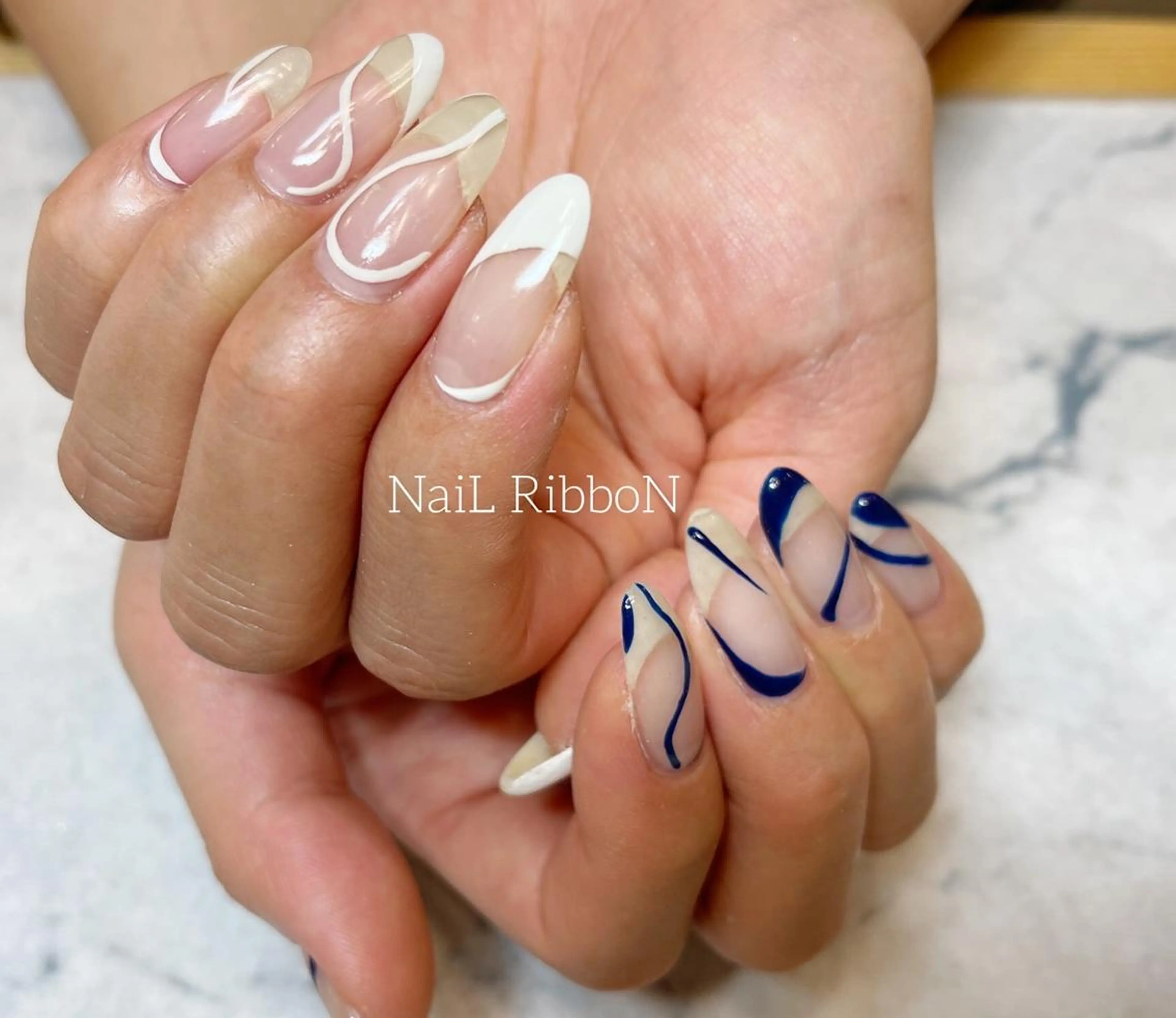 ネイル ネイルリボン 受付スタッフのネイルデザイン