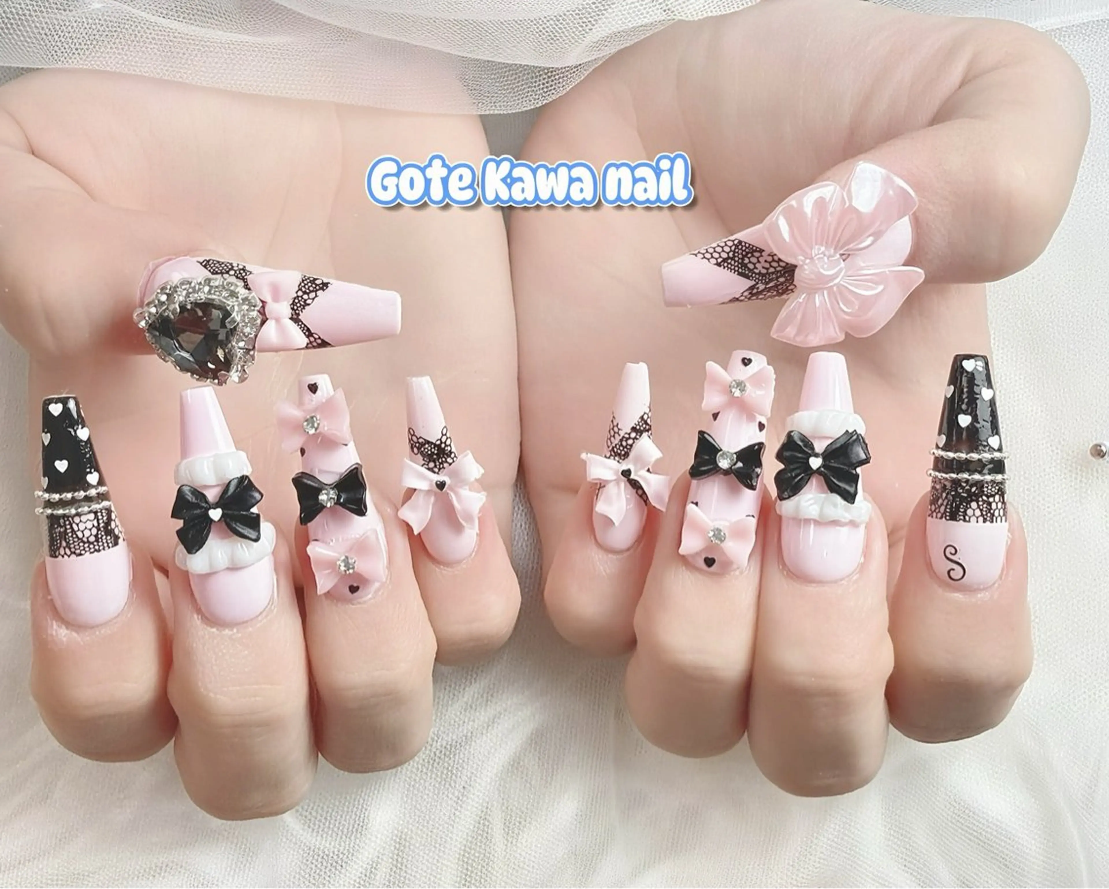 ネイル レース ピンク リボン ハンドネイル ハンドケア Gote Kawa nail salonのネイルデザイン