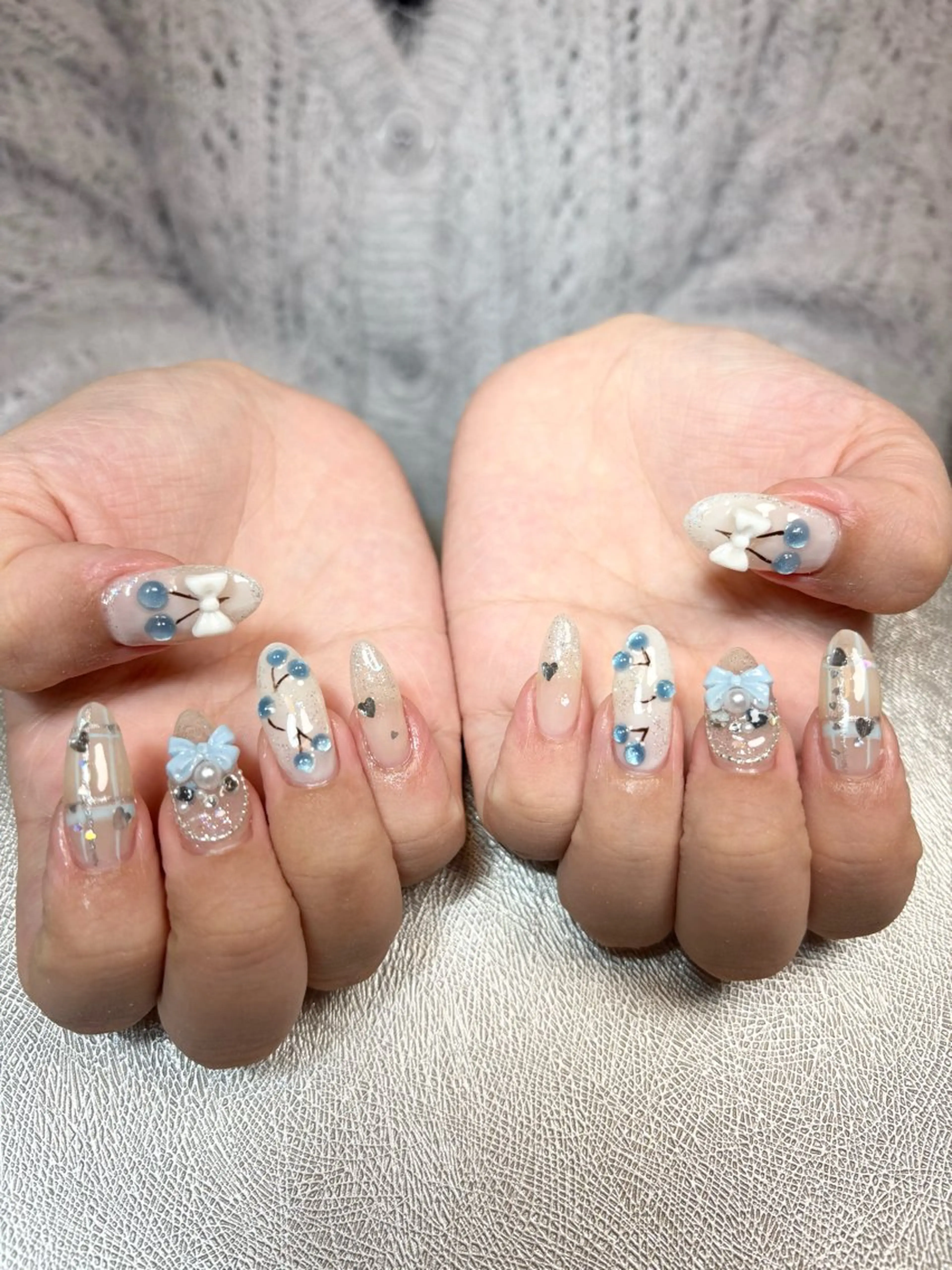 ネイル 長さ出し キラキラネイル 水色 リボン ハンドネイル ✨韓国✨nail salonLumieのネイルデザイン