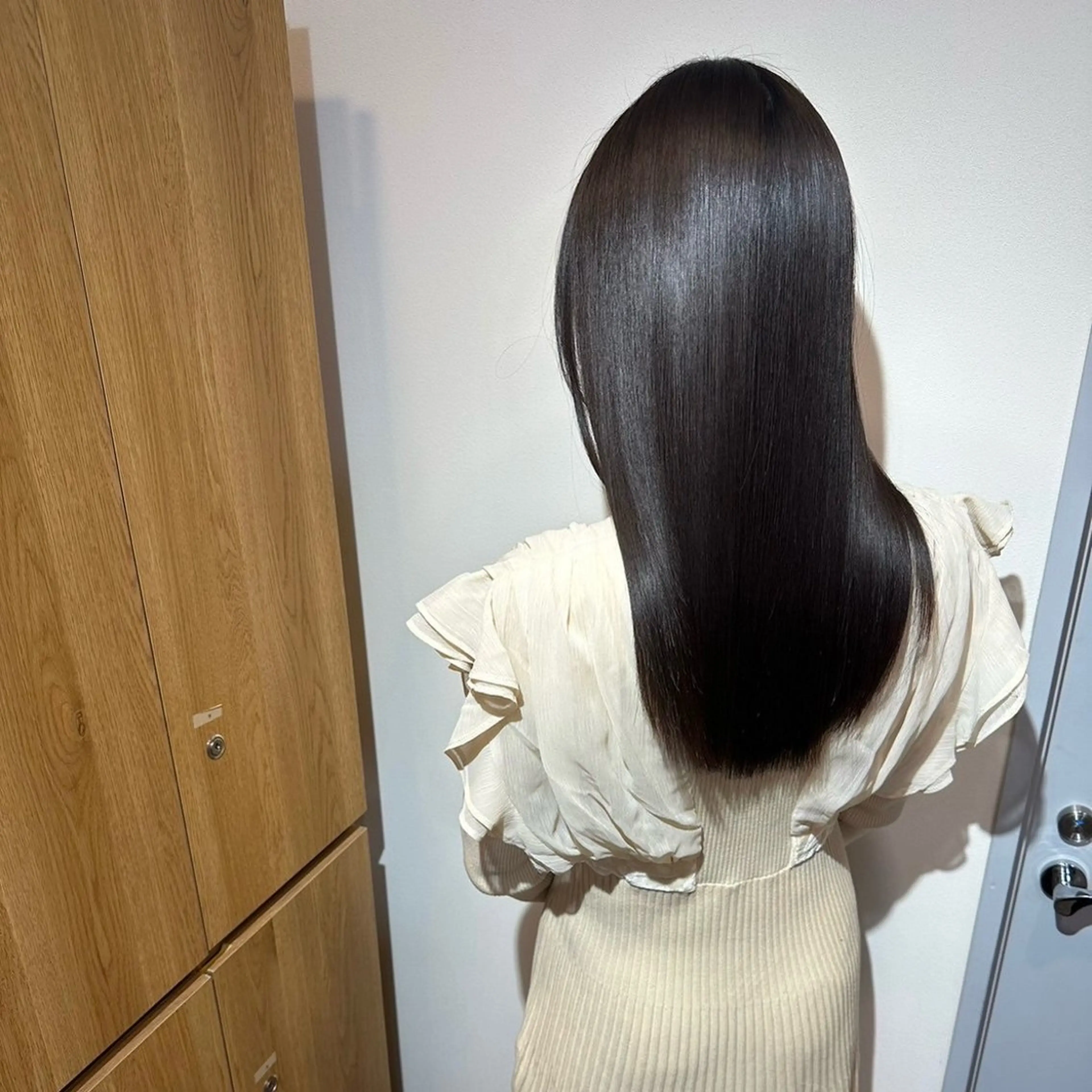 ロング 岡田 佳子のヘアスタイル