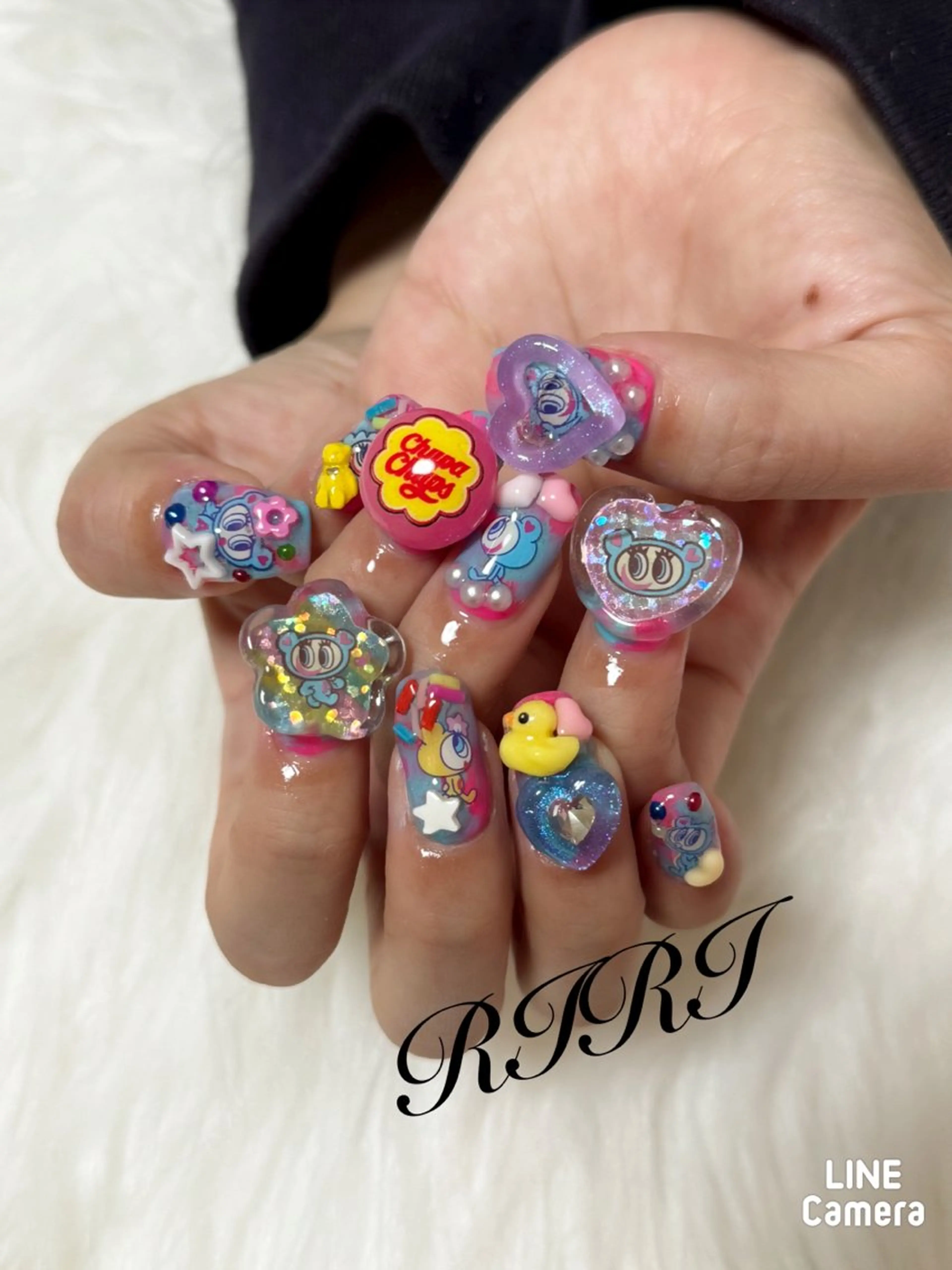 ネイル ブルー ジェルネイル ハート キラキラネイル ショートネイル riri オーナーのネイルデザイン