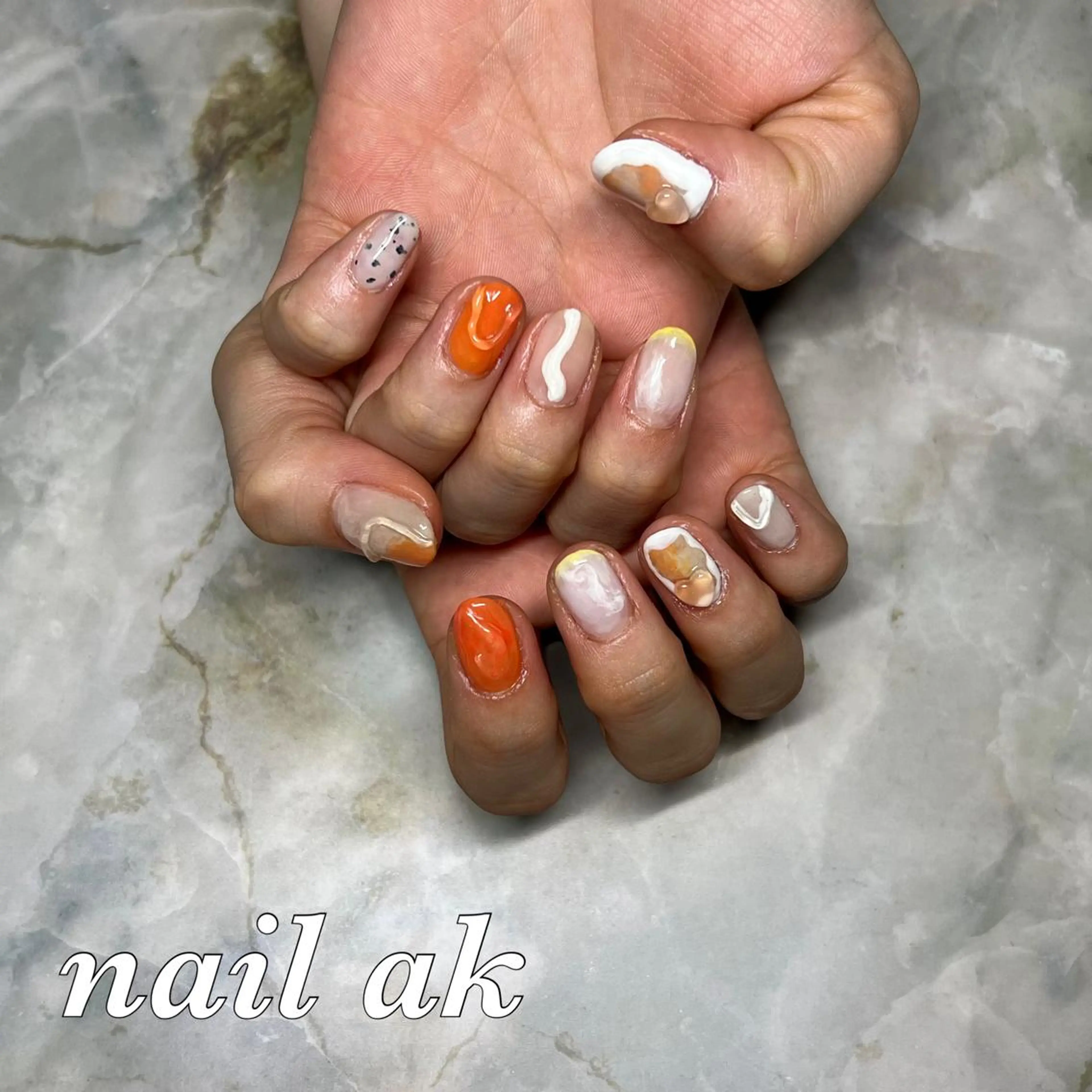 ネイル ニュアンスネイル オレンジ ハンドネイル ak nail .のネイルデザイン