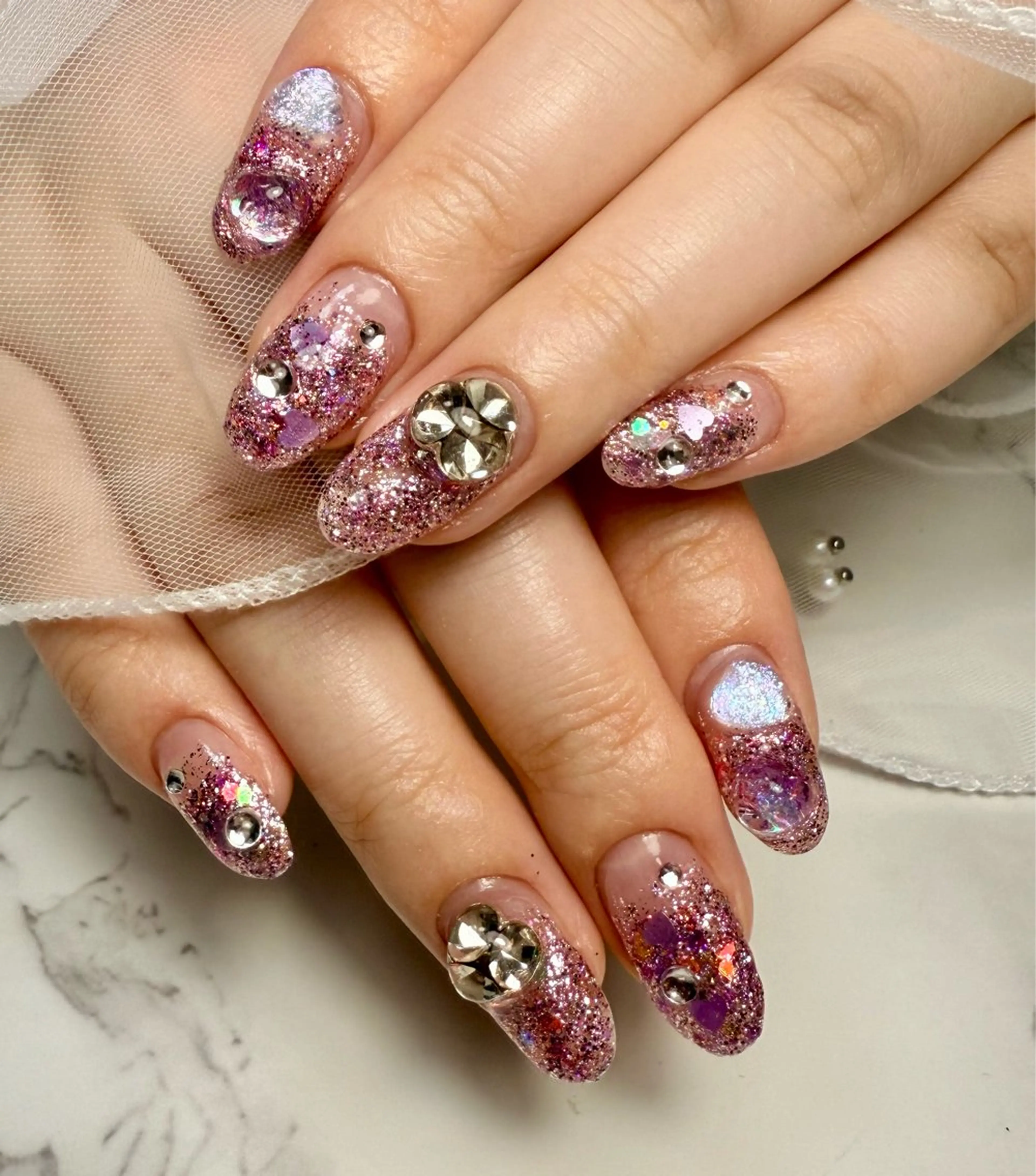 ネイル アートネイル チークネイル 氷ネイル・うるうるネイル キラキラネイル ラメ(グリッター) M.N_ nailのネイルデザイン