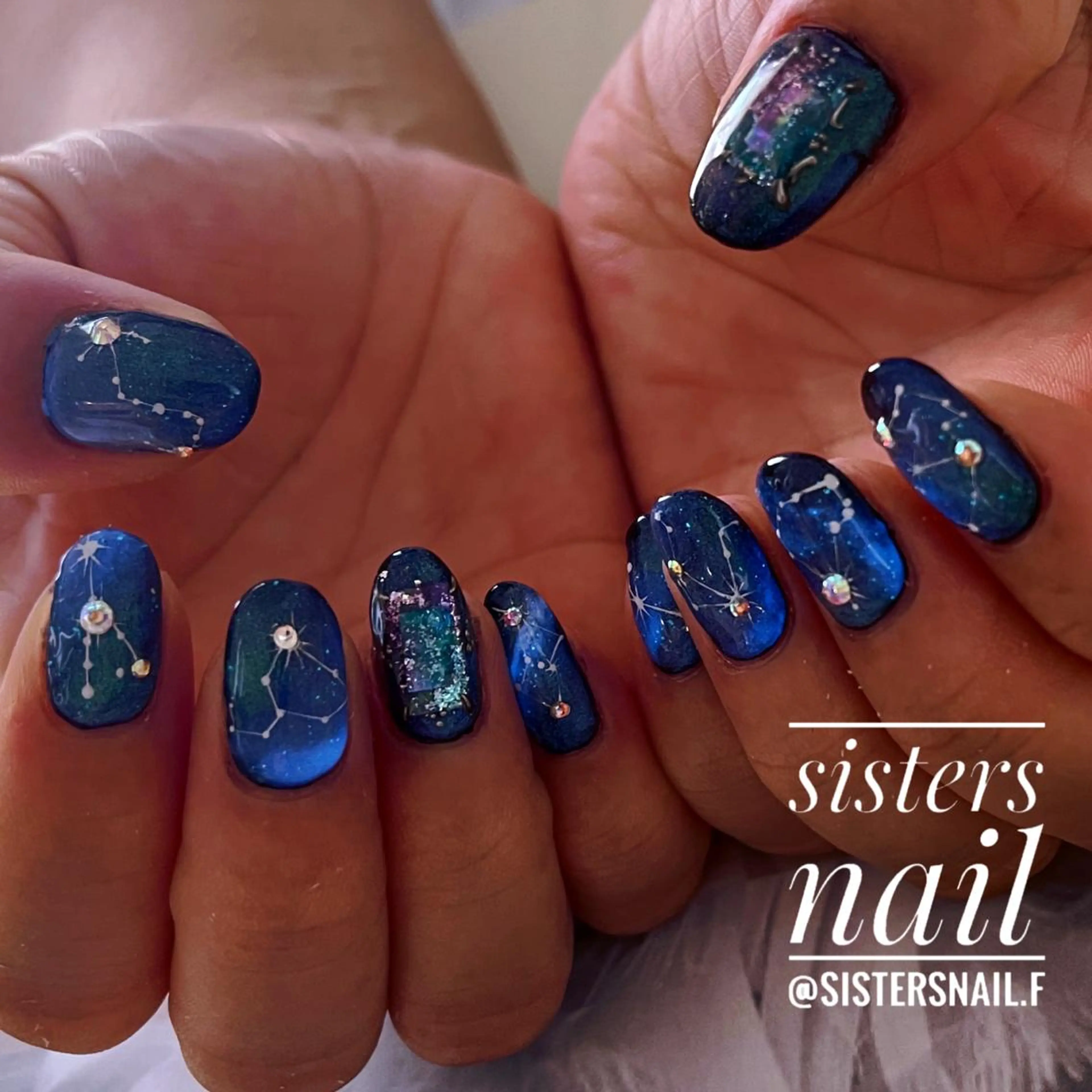 ネイル アートネイル キラキラネイル マグネットネイル 冬ネイル sisters nail.fのネイルデザイン