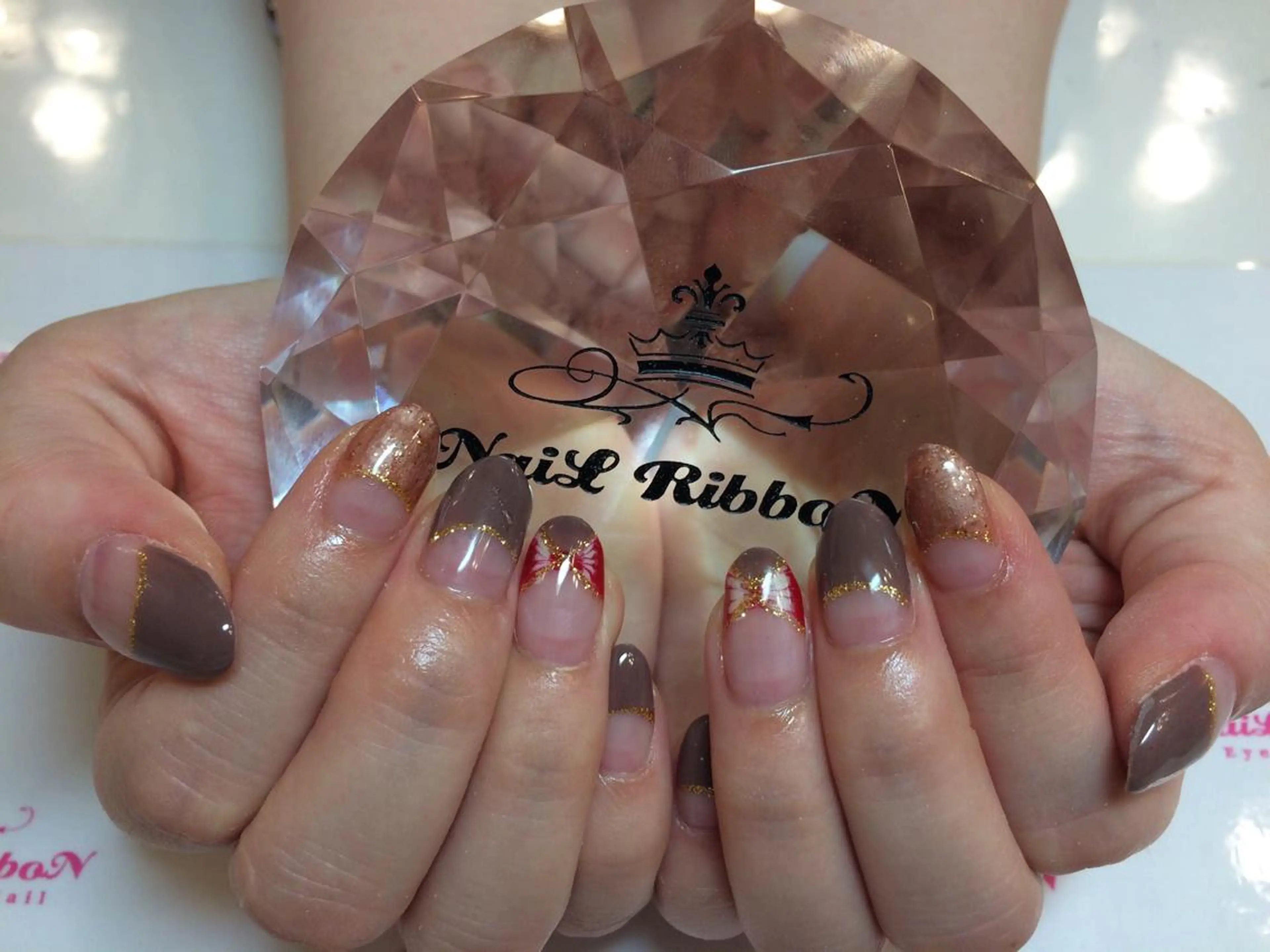 ネイル ネイルリボン 受付スタッフのネイルデザイン