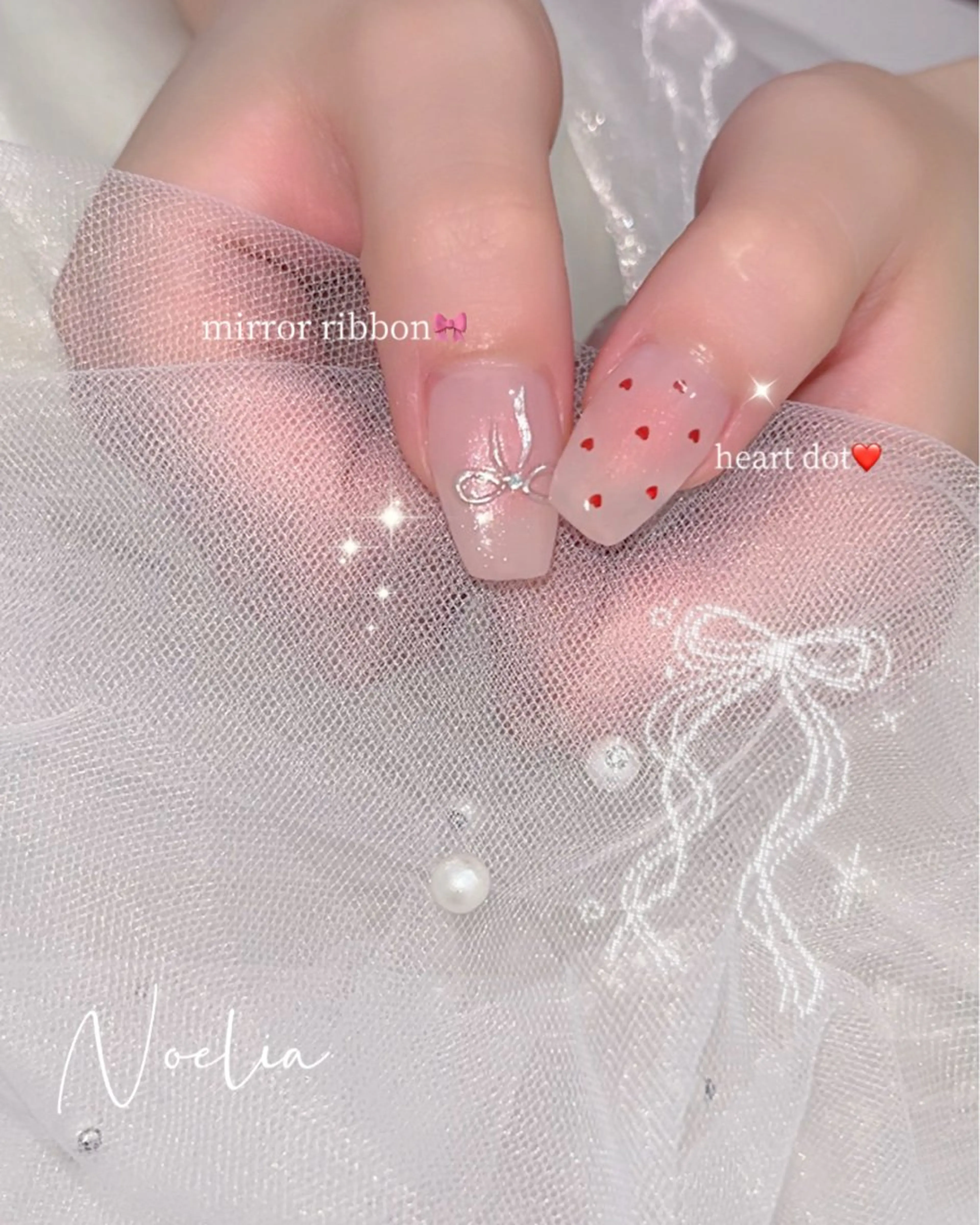 ネイル ドット ハート リボン -Noelia- yukiのネイルデザイン