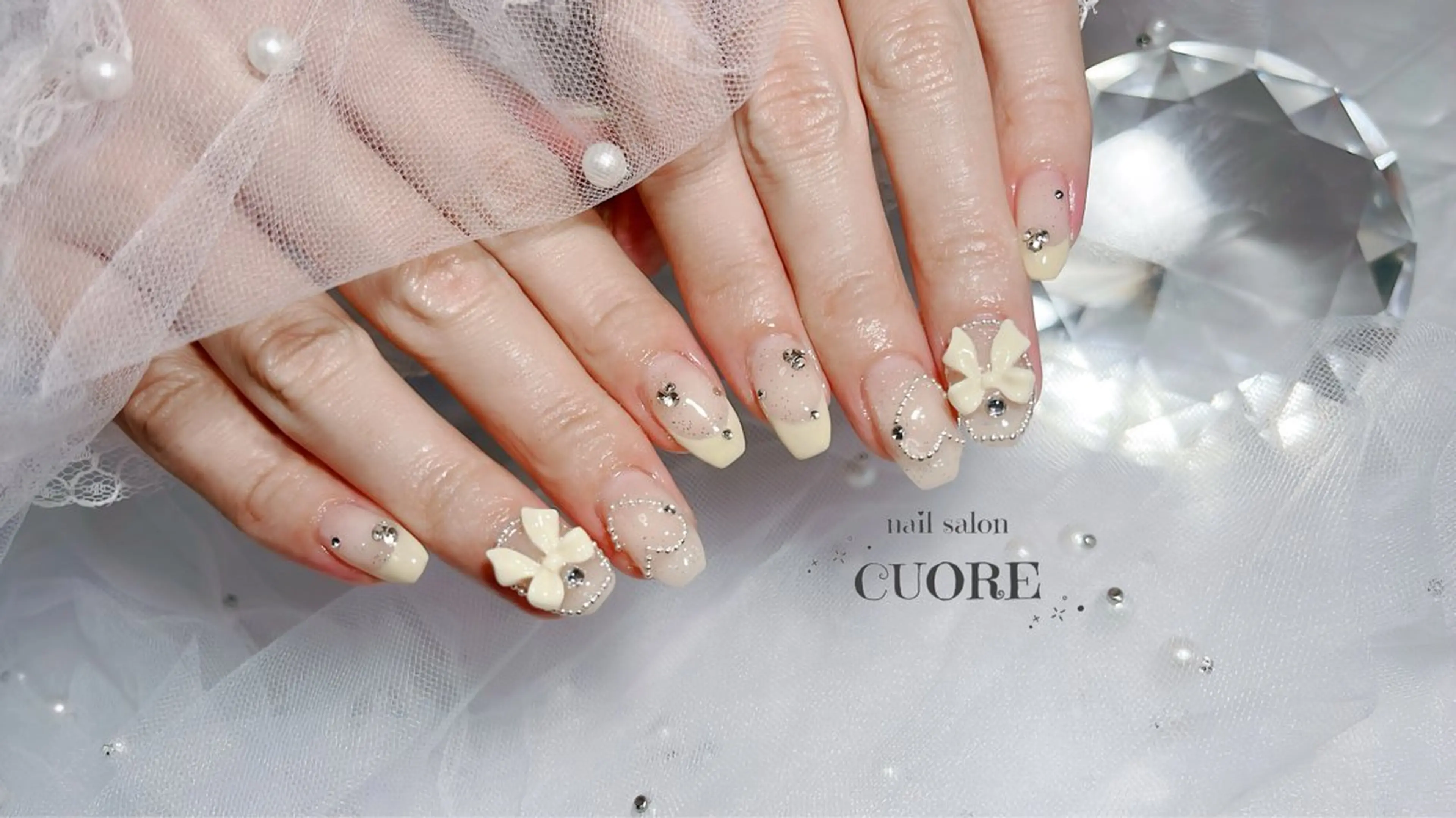 ネイル フレンチネイル パステルネイル リボン 黄色 CUORE____nail所属・nail salon CUOREのネイルデザイン