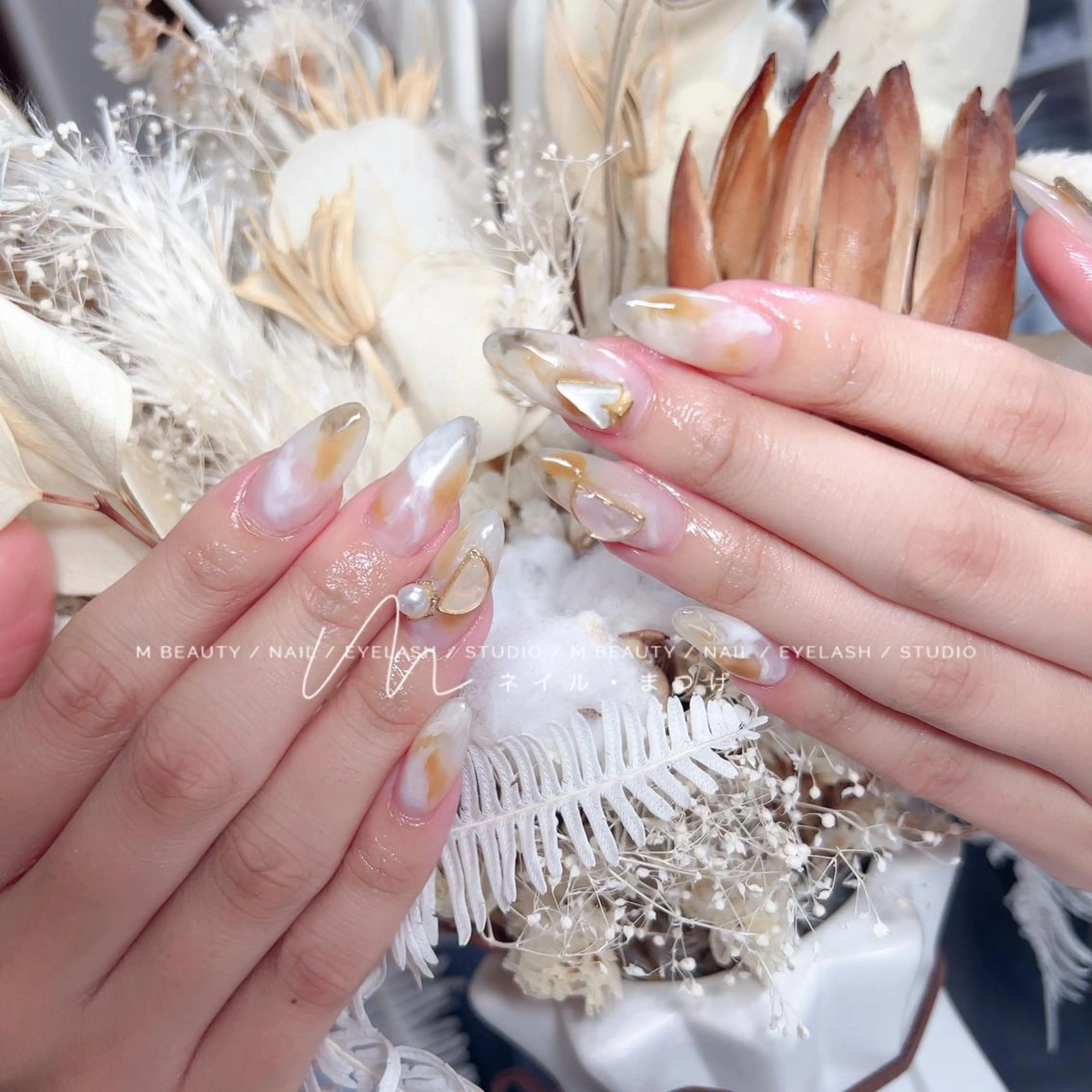 ネイル ハンドネイル M🌷nail 長さだし専門店のネイルデザイン