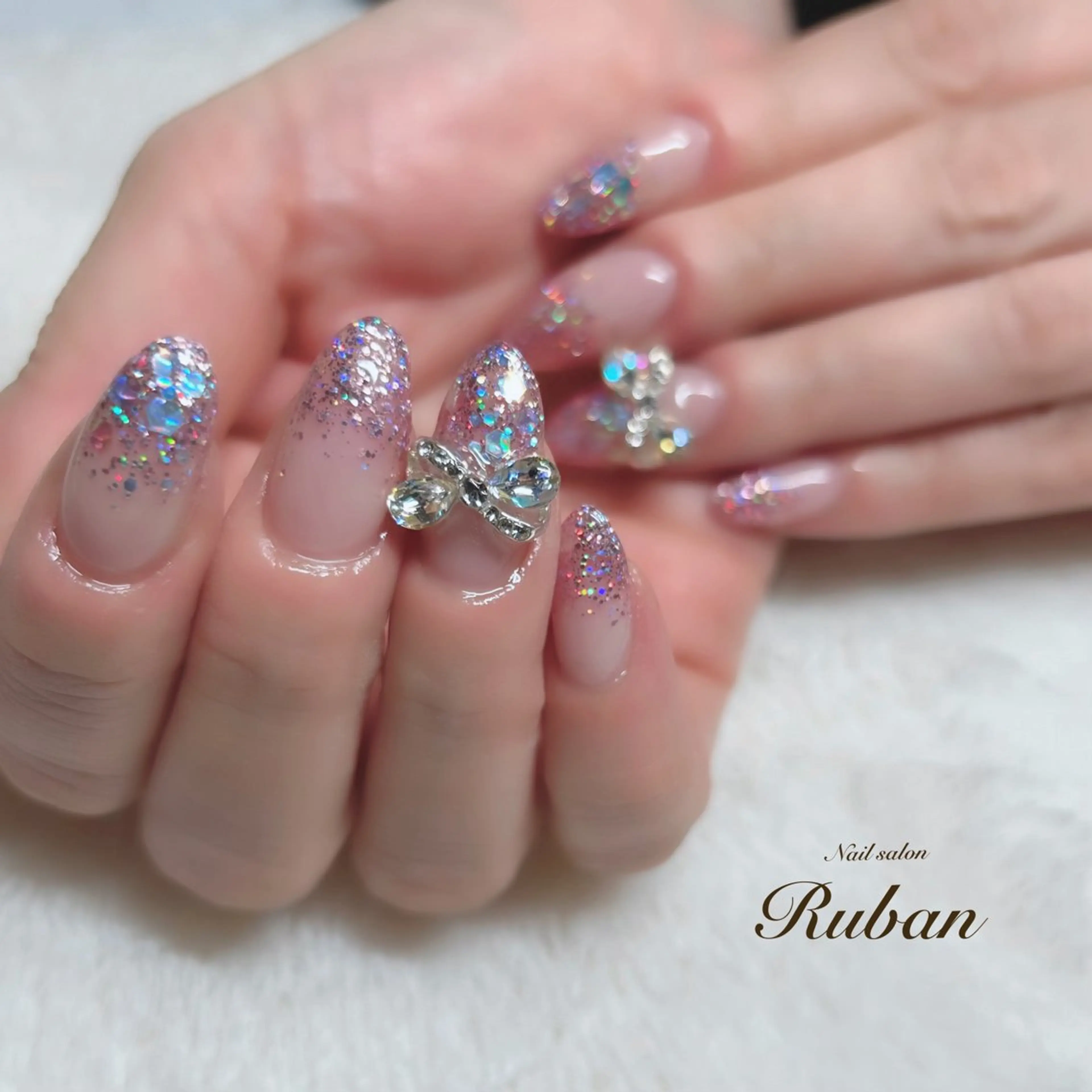 ネイル グラデーション ラメ(グリッター) ラメグラデーション リボン Nail salon Rubanのネイルデザイン