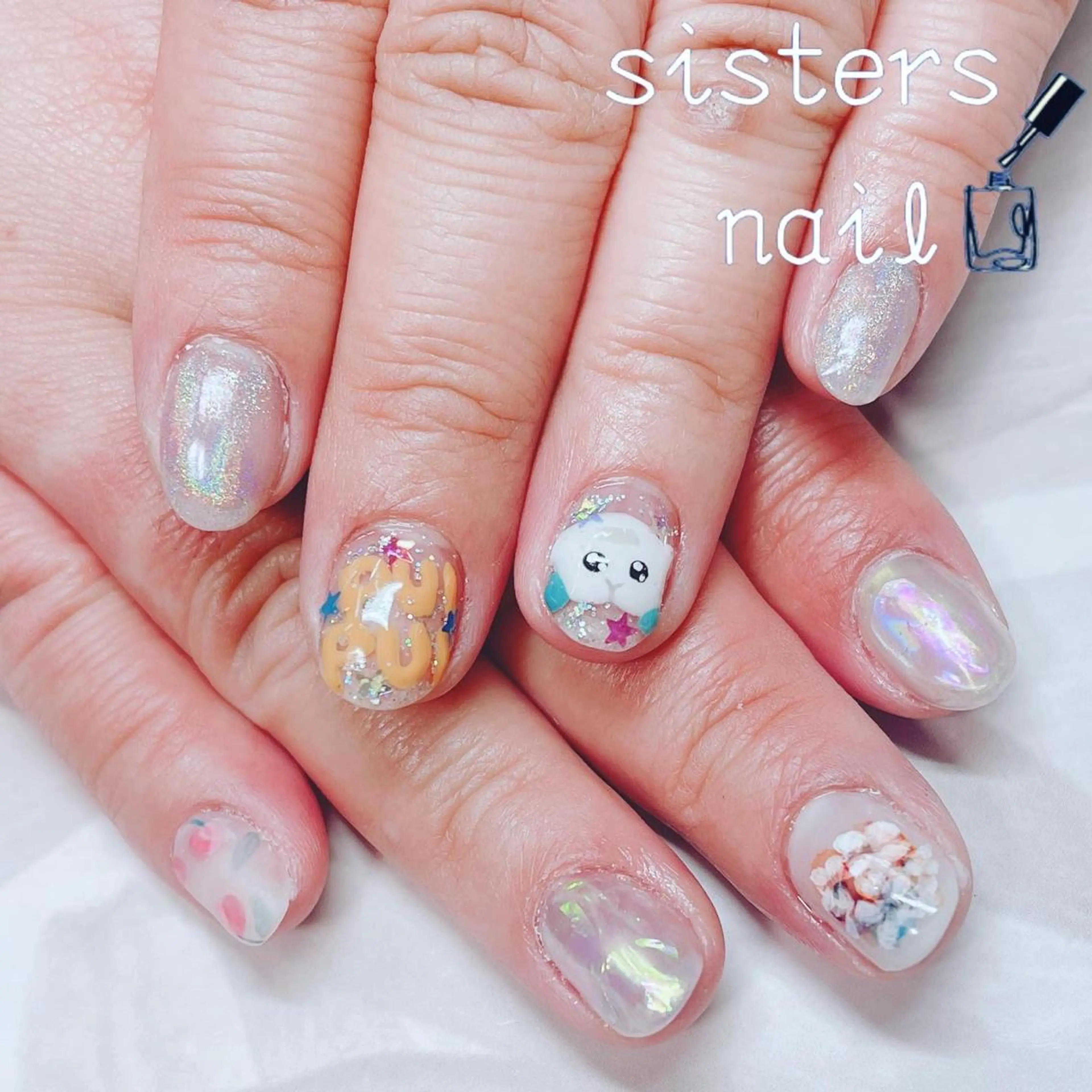 ネイル アートネイル フラワーネイル キラキラネイル 春ネイル ハンドネイル ハンドケア sisters nail.fのネイルデザイン