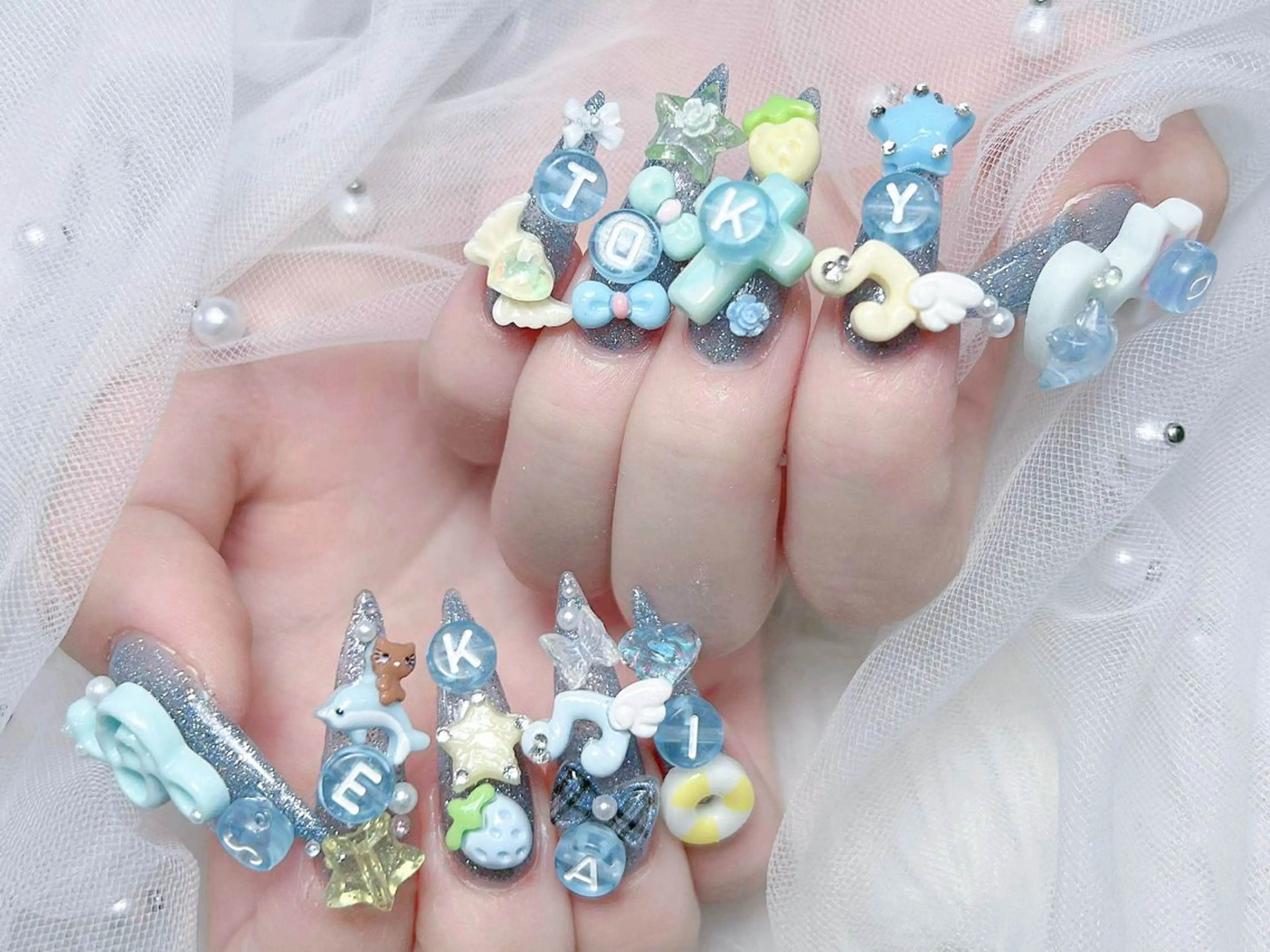 ネイル 成人式 ロングネイル マグネットネイル 大理石ネイル(マーブル) リボン ハンドネイル MoMoA Nail ネイル長さ出し専門店のネイルデザイン