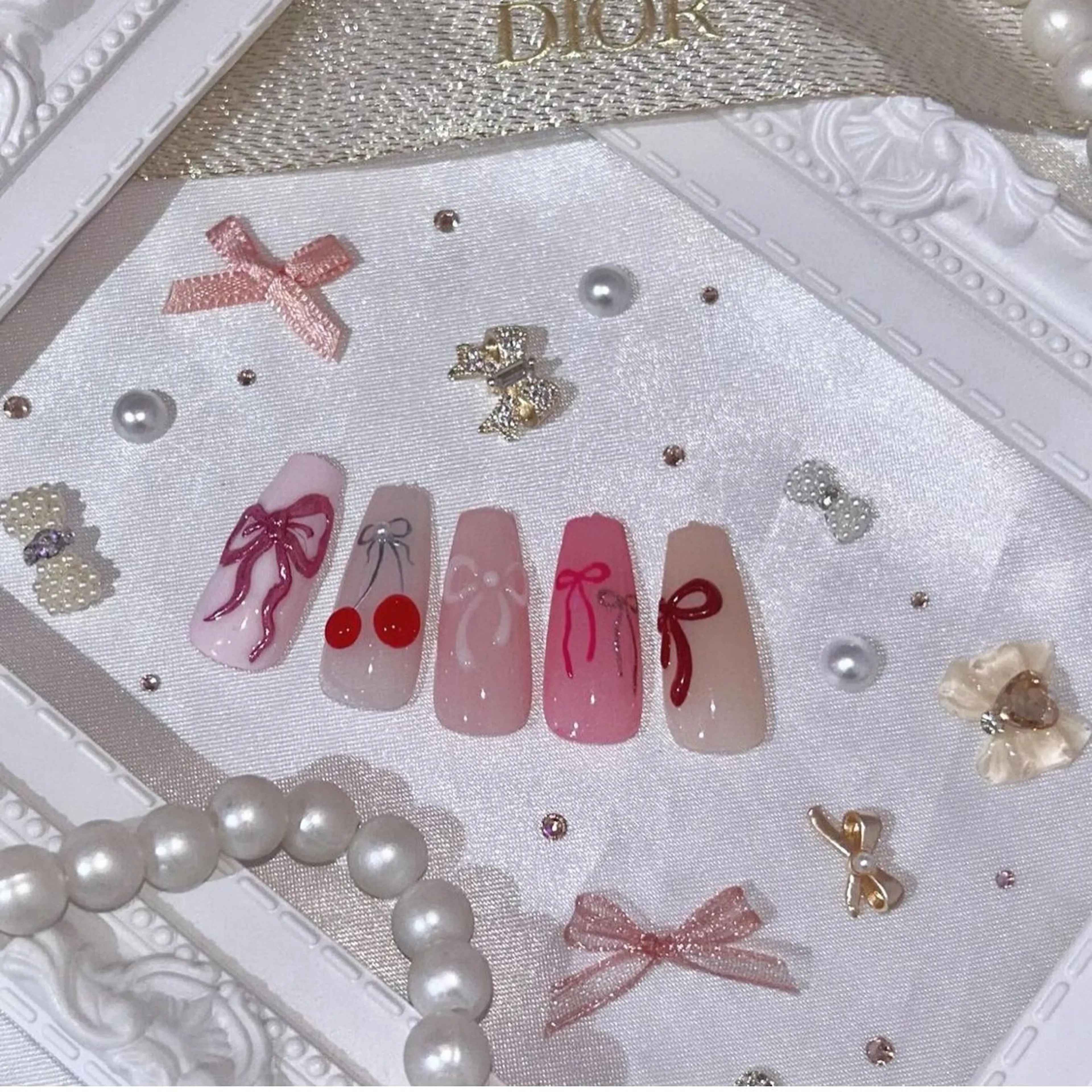 ネイル アートネイル 韓国ネイル リボン 春ネイル 夏ネイル élu by Noriko 前原のネイルデザイン