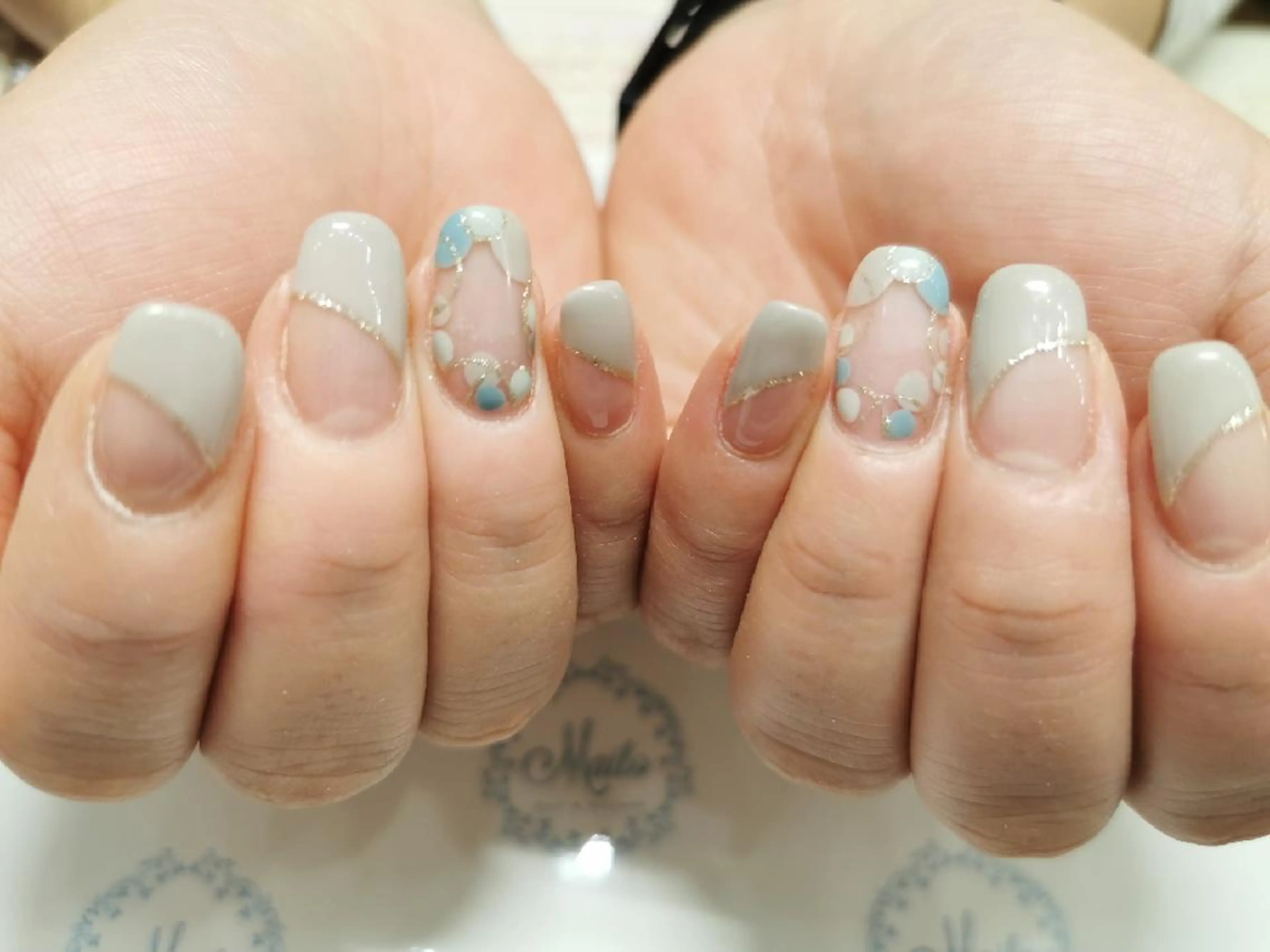 ネイル ネイルリボン 受付スタッフのネイルデザイン