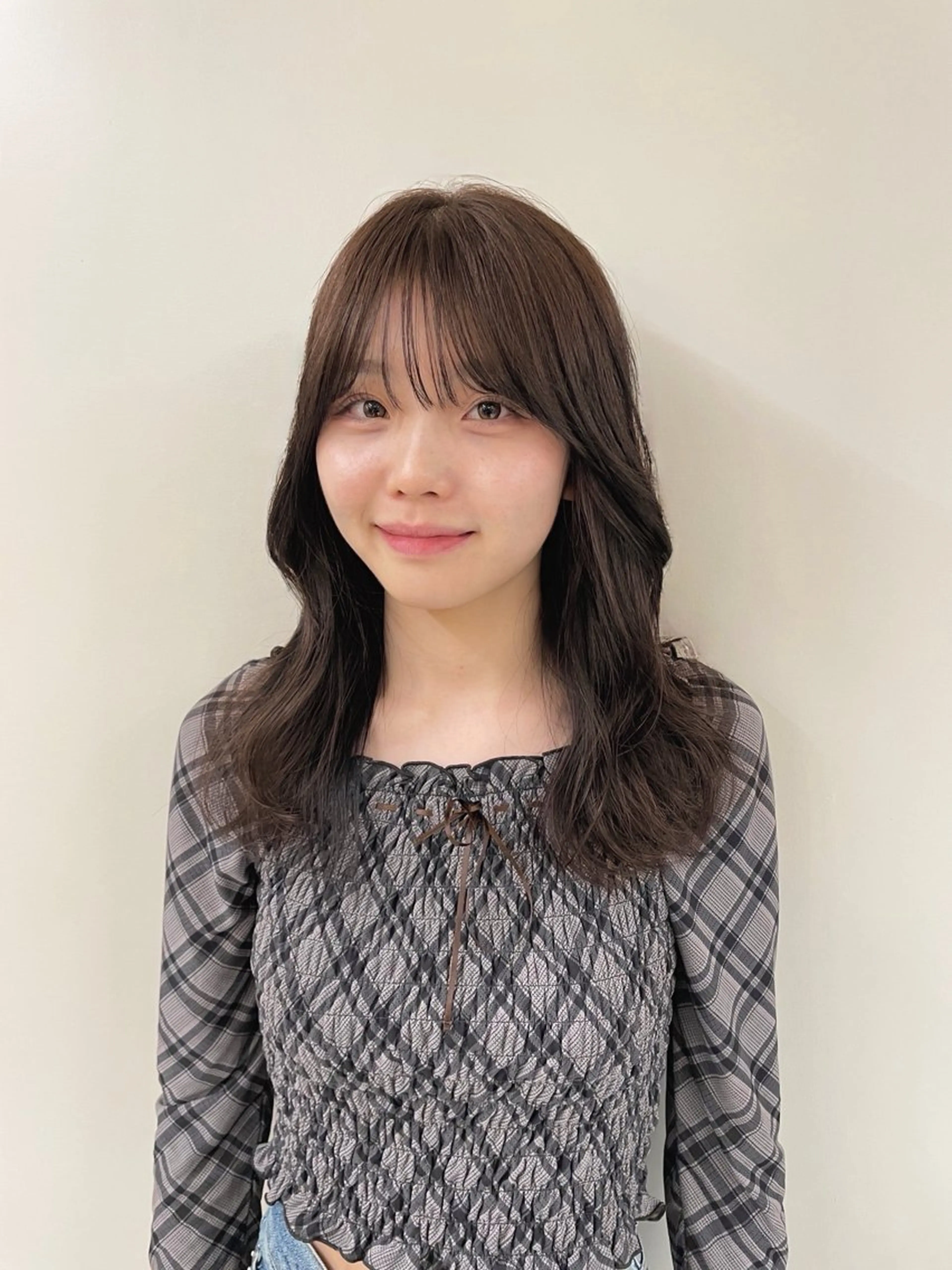 ロング une所属・kunimi harukaのヘアスタイル