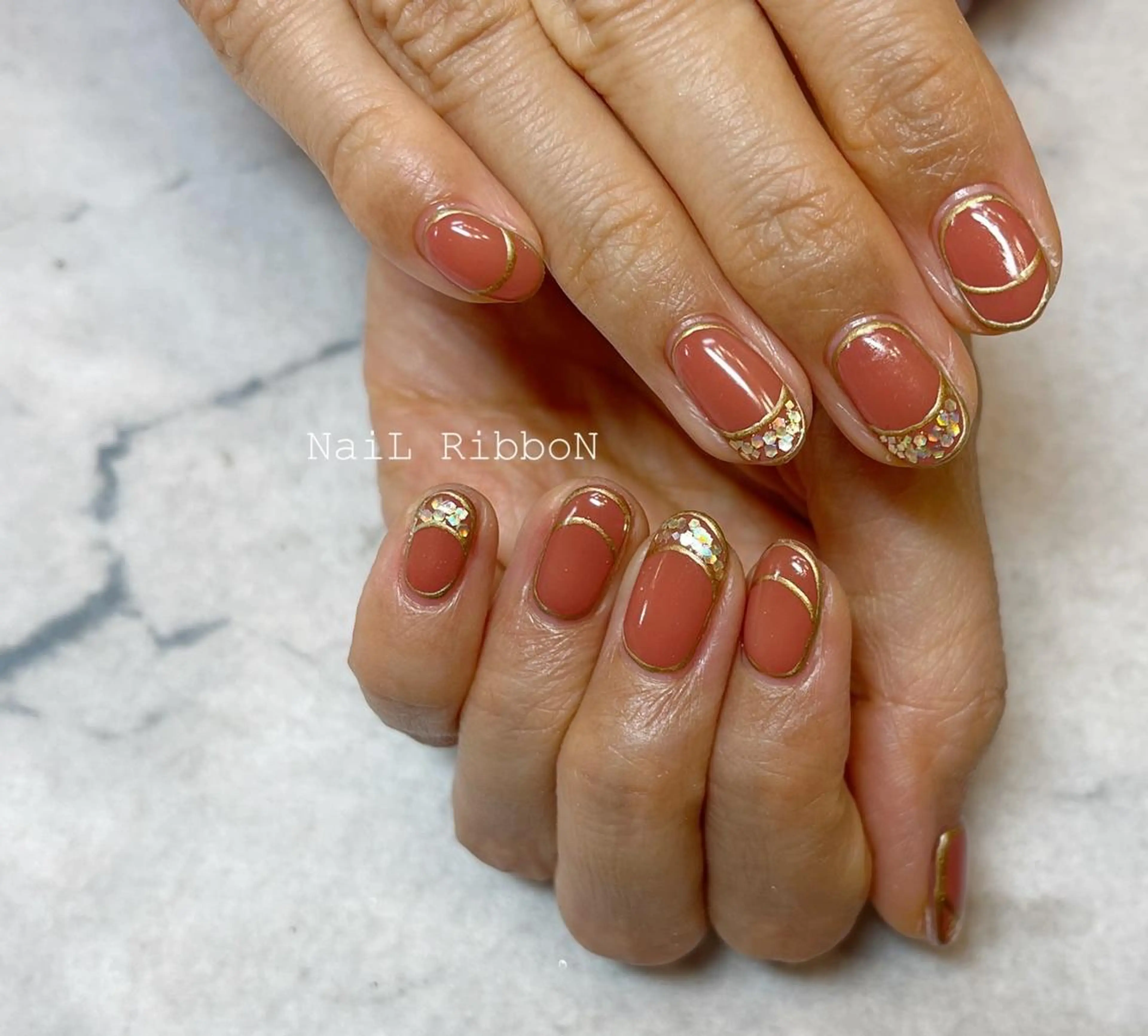 ネイル ネイルリボン 受付スタッフのネイルデザイン
