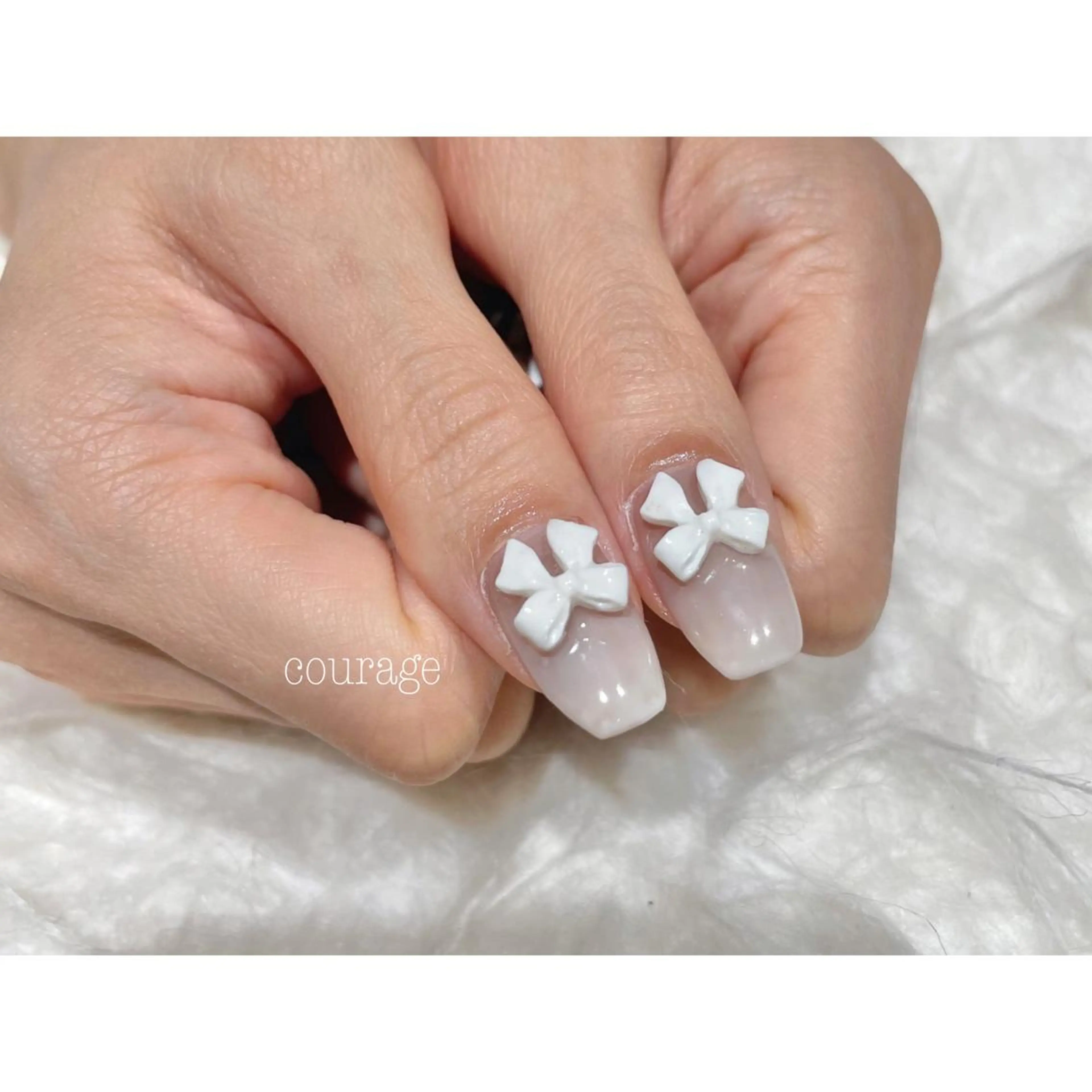 ネイル リボン ハンドネイル ネイルサロンcourage所属・ネイルサロン courageのネイルデザイン