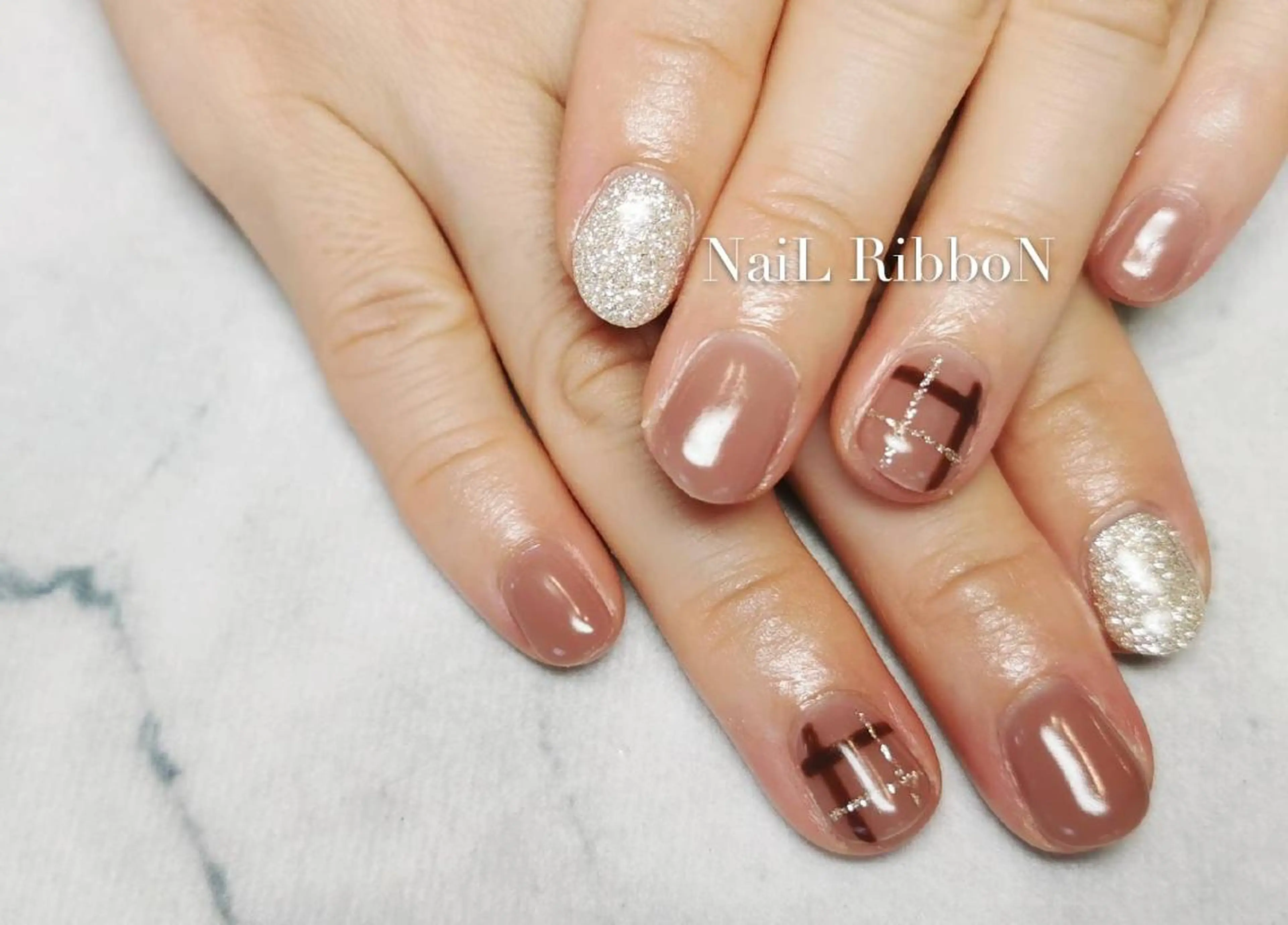 ネイル ネイルリボン 受付スタッフのネイルデザイン